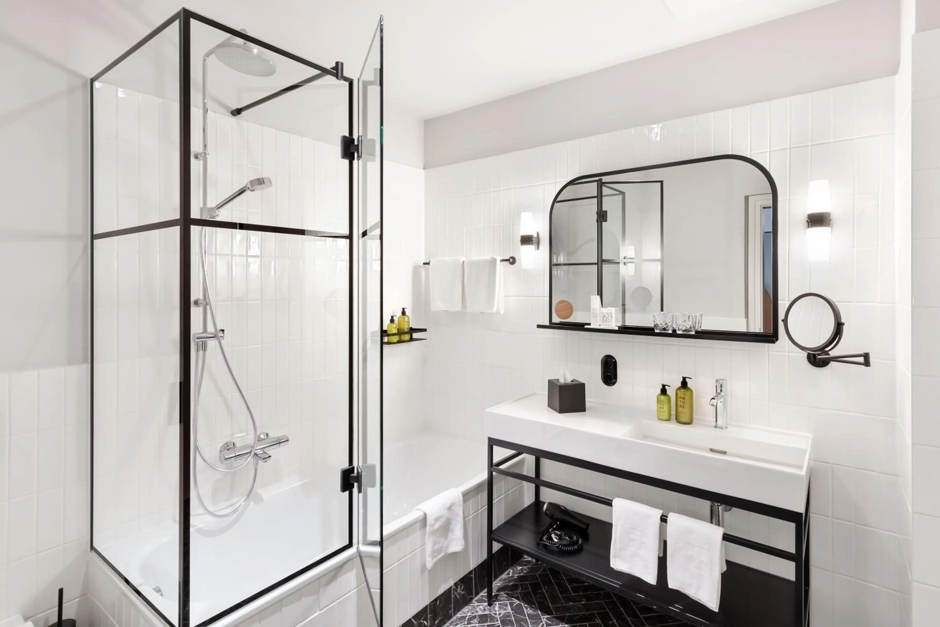 Bathroom in Hotel Astoria Vienna, Curio Collection by Hilton