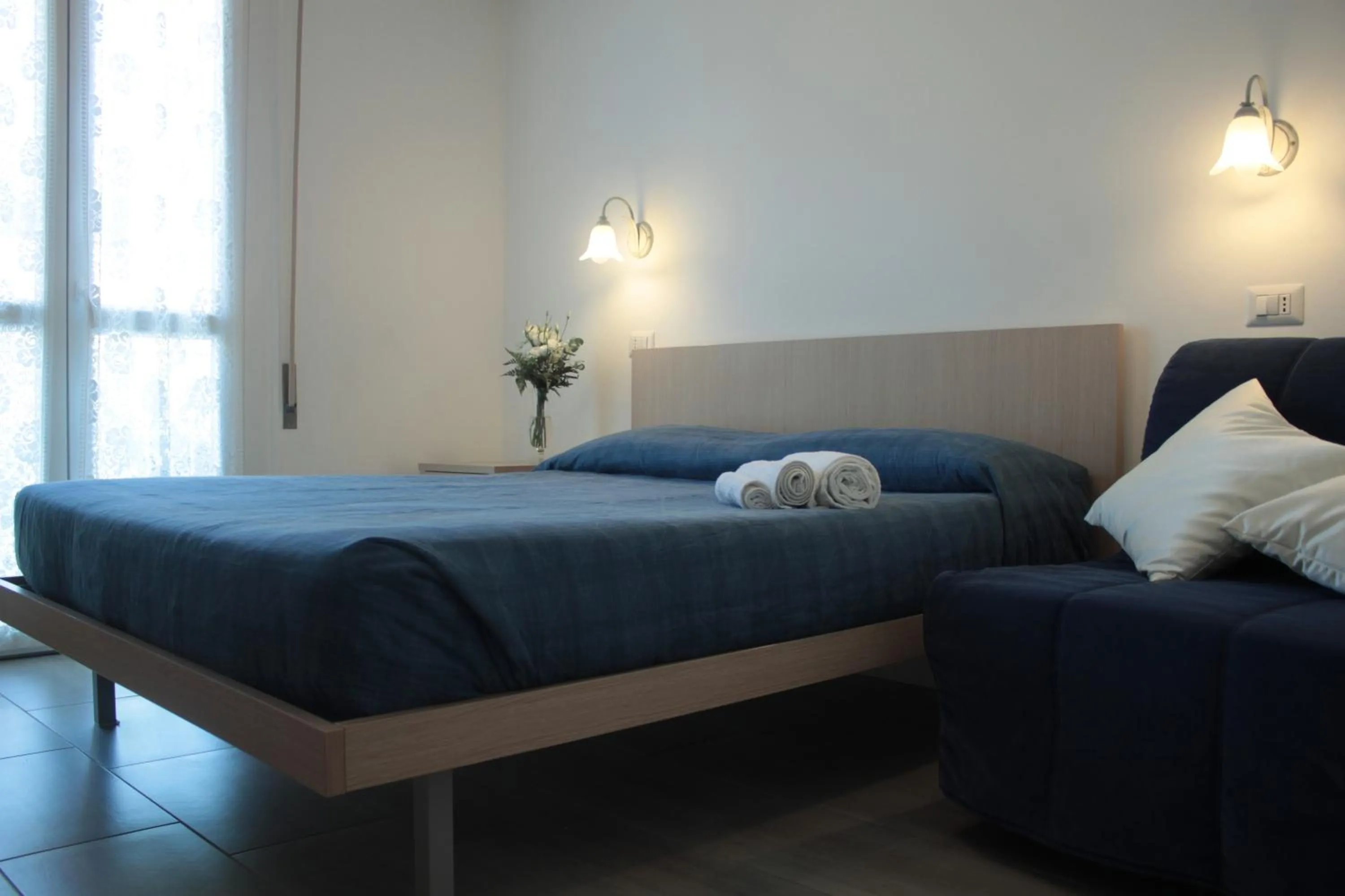 Bed in Garnì Stella Marina