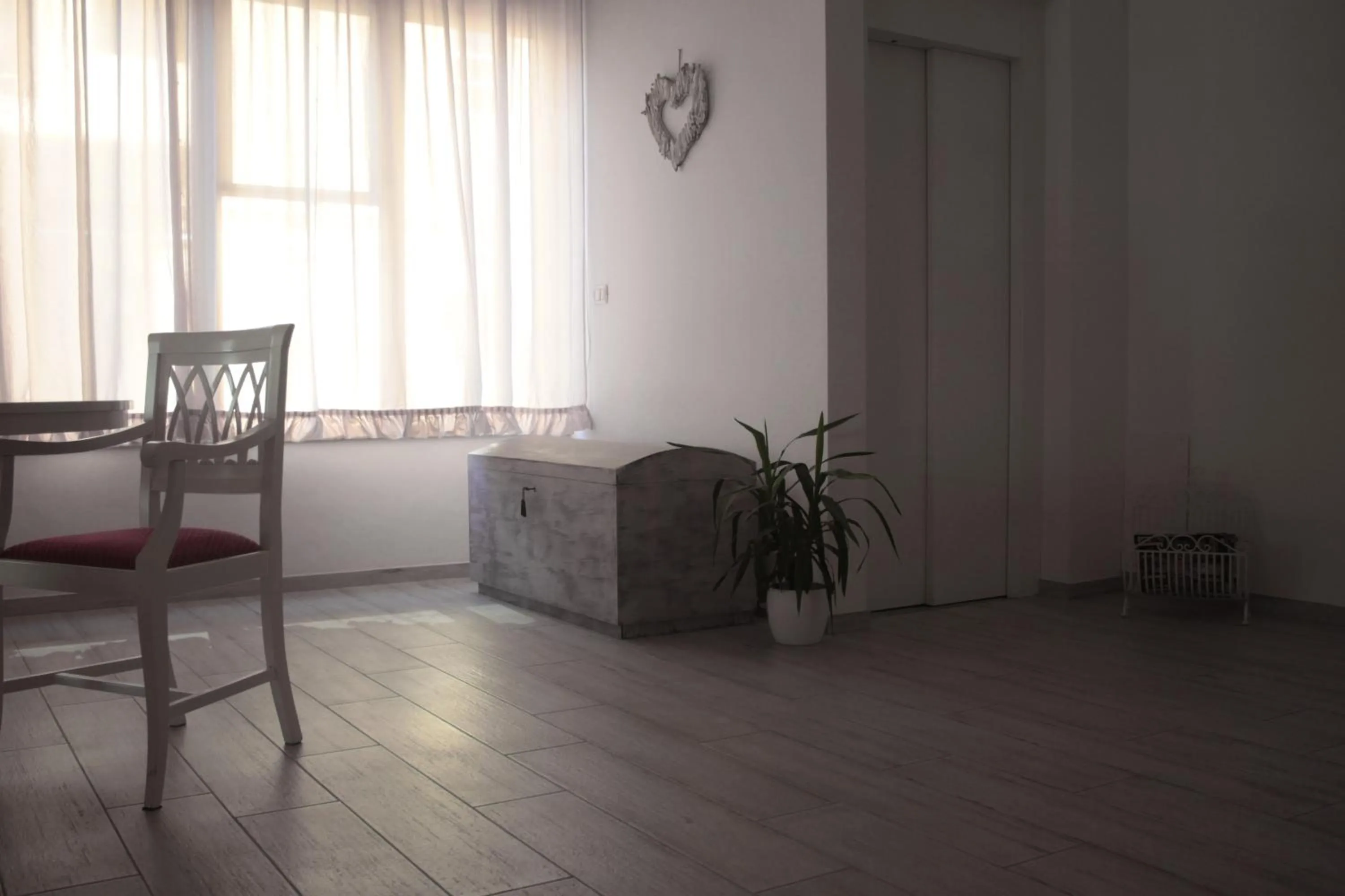 Communal lounge/ TV room in Garnì Stella Marina