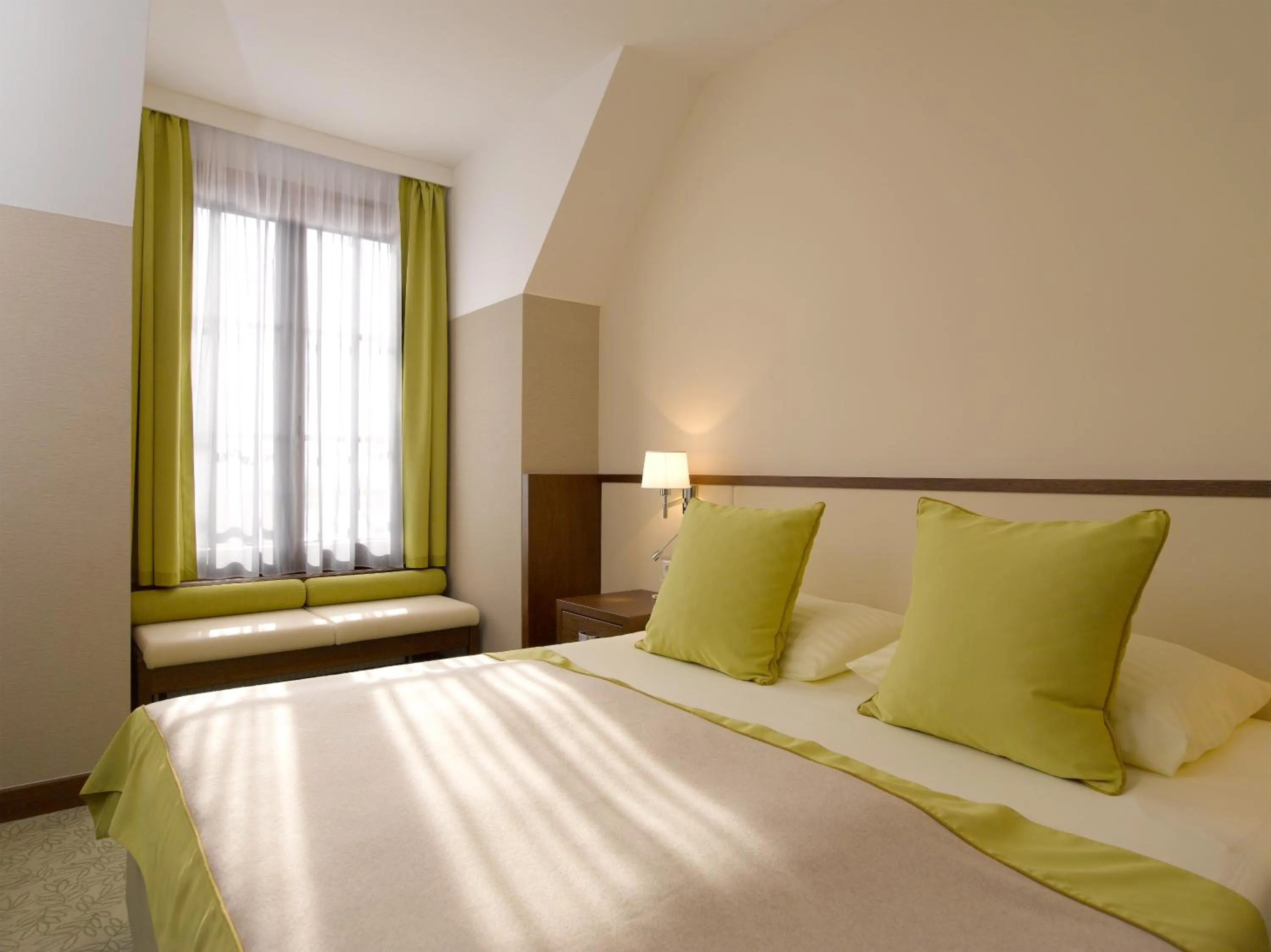 Photo of the whole room, Bed in Seehotel Rust