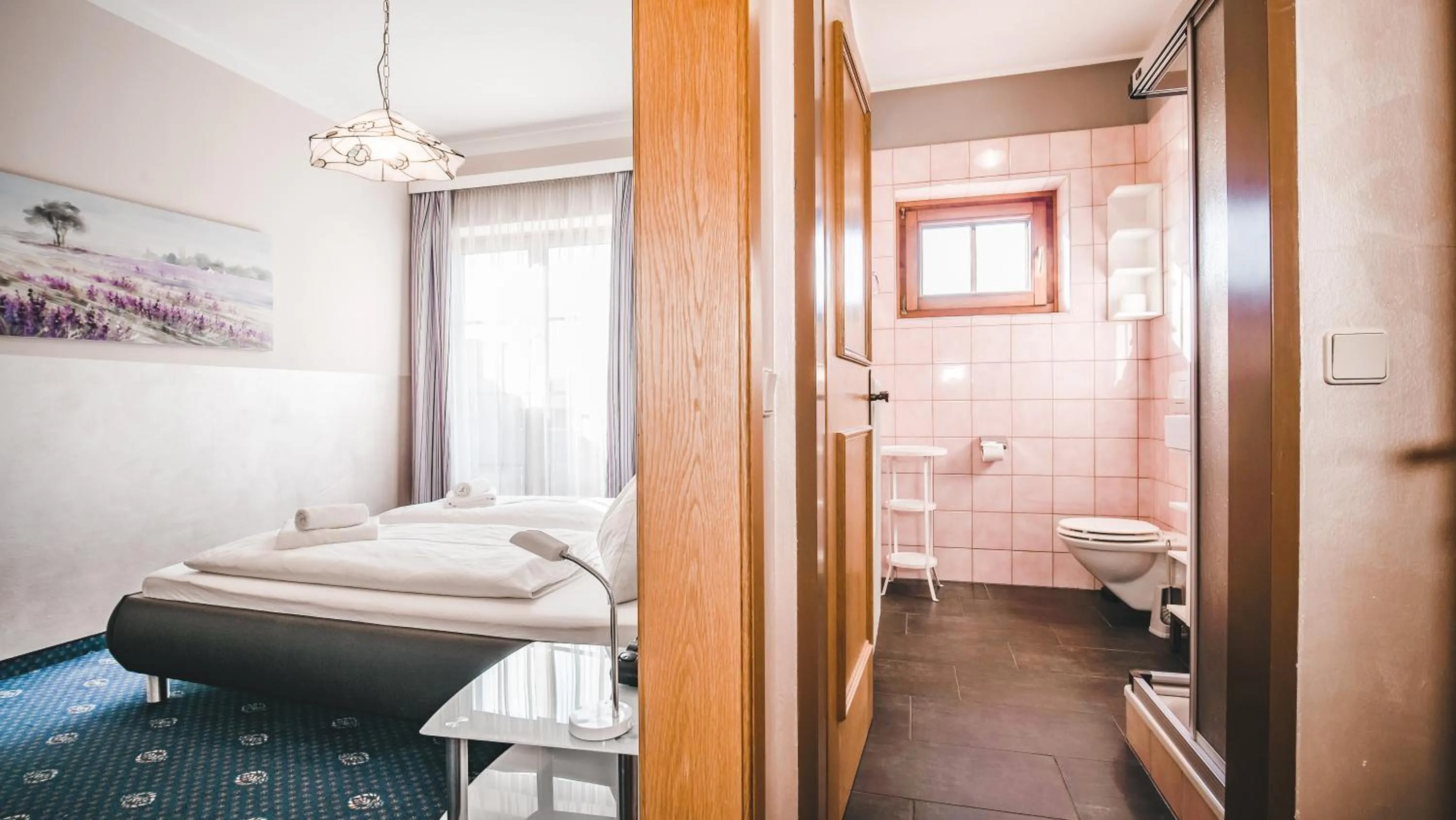 Photo of the whole room, Bed in Hotel Kärntnerhof Velden by S4Y