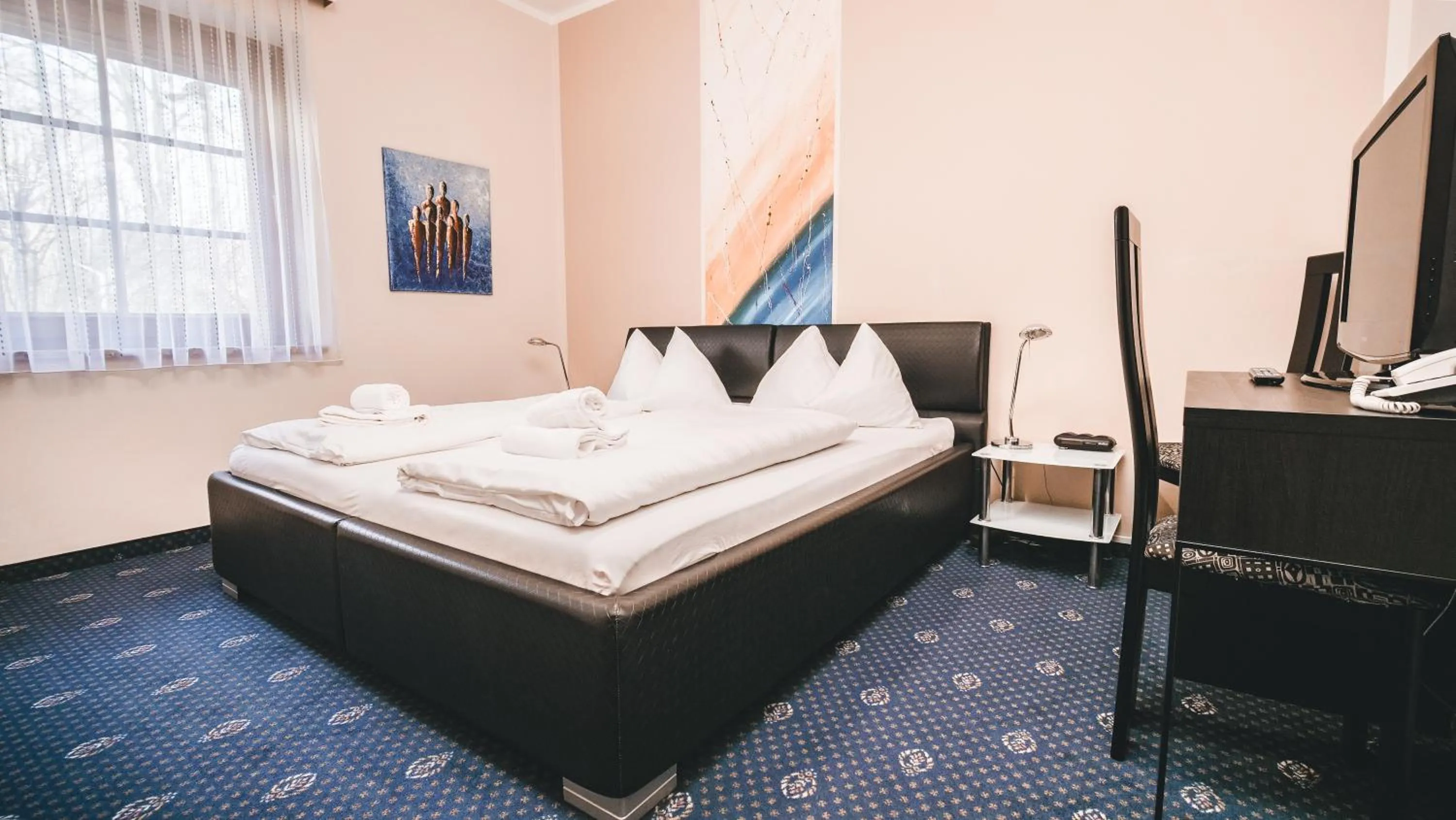 Bedroom, Bed in Hotel Kärntnerhof Velden by S4Y