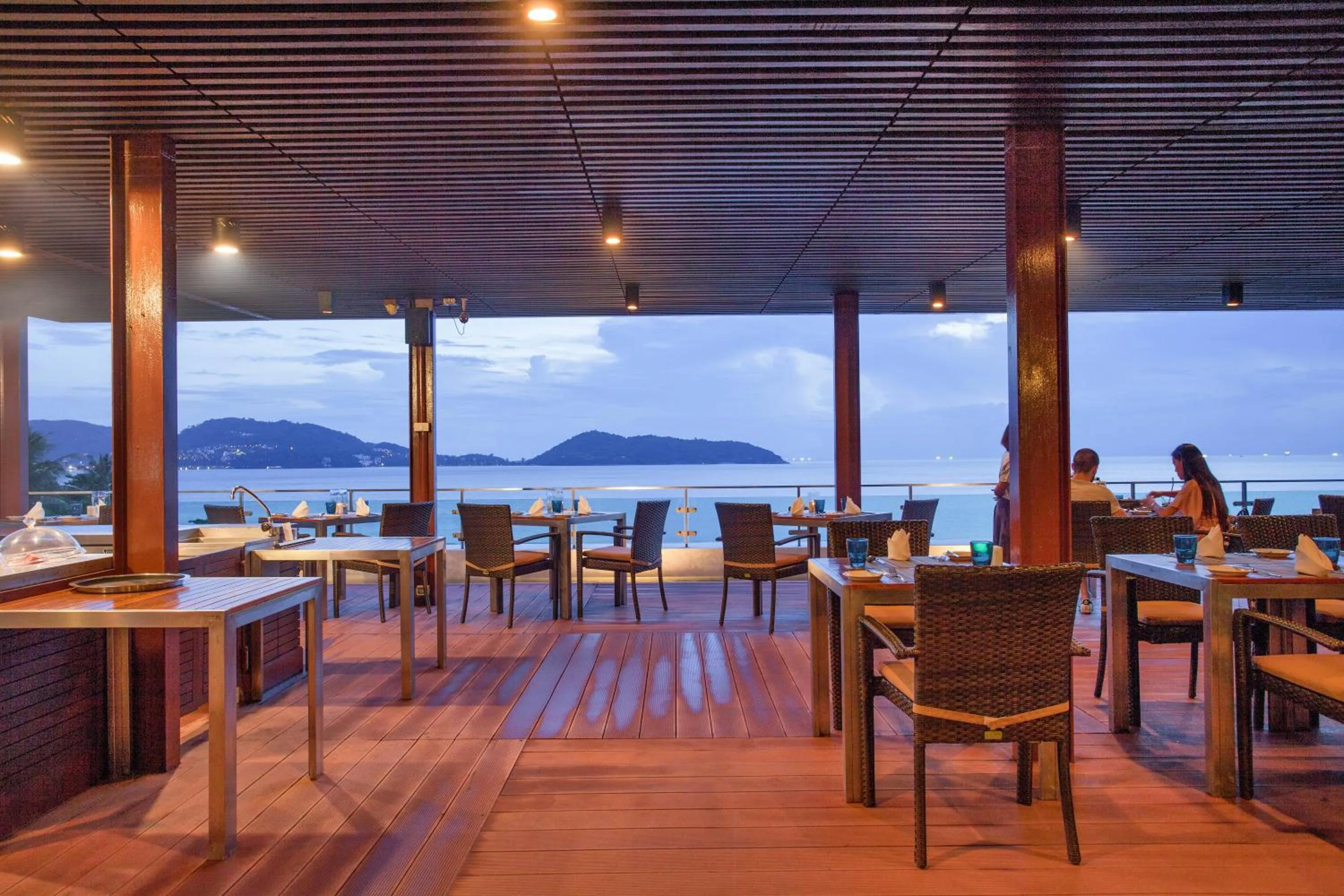 Dining area in Zenmaya Oceanfront Phuket, Trademark Collection by Wyndham