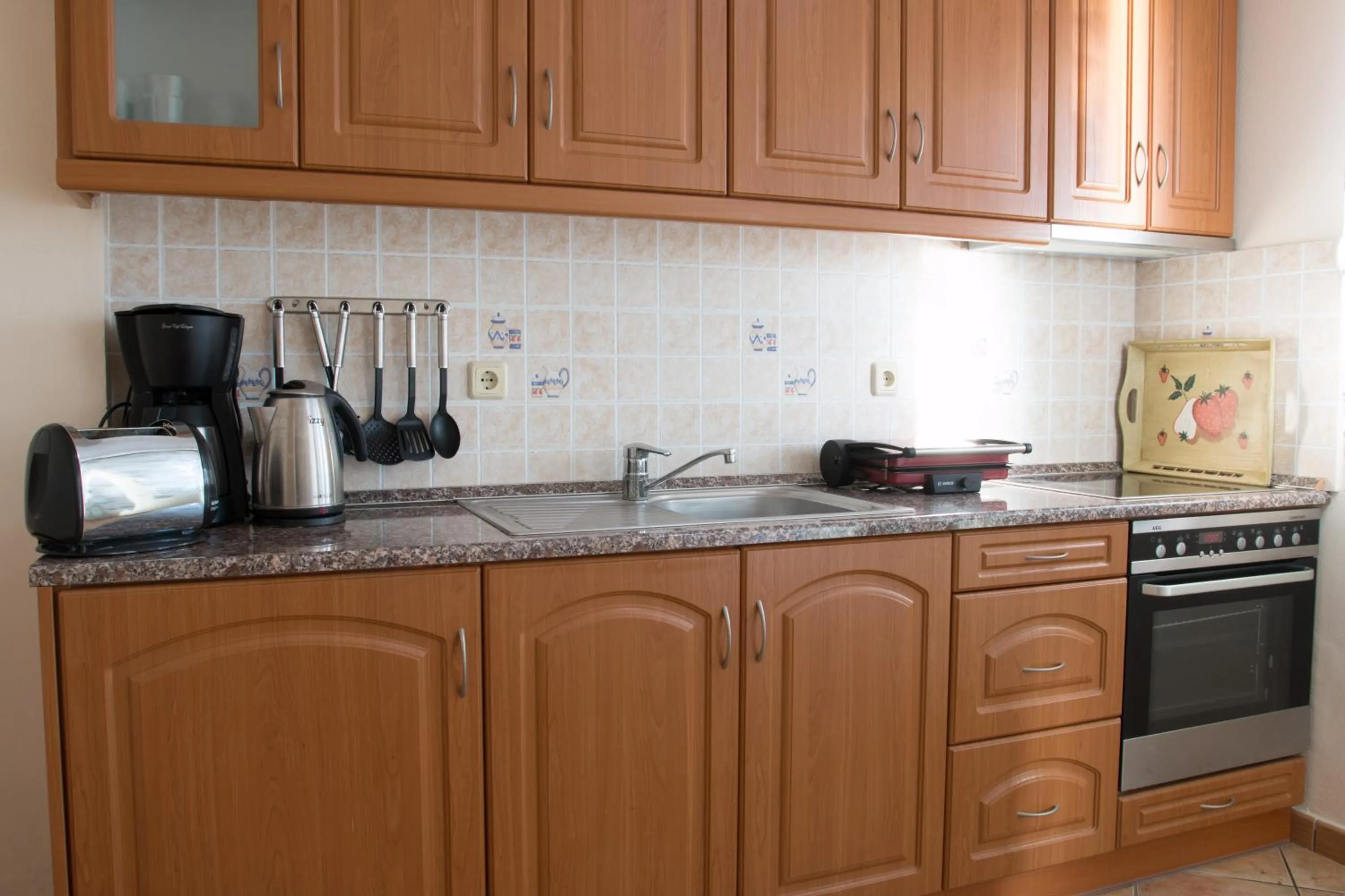 Kitchen or kitchenette in Paris-Irini Studios And Apartments