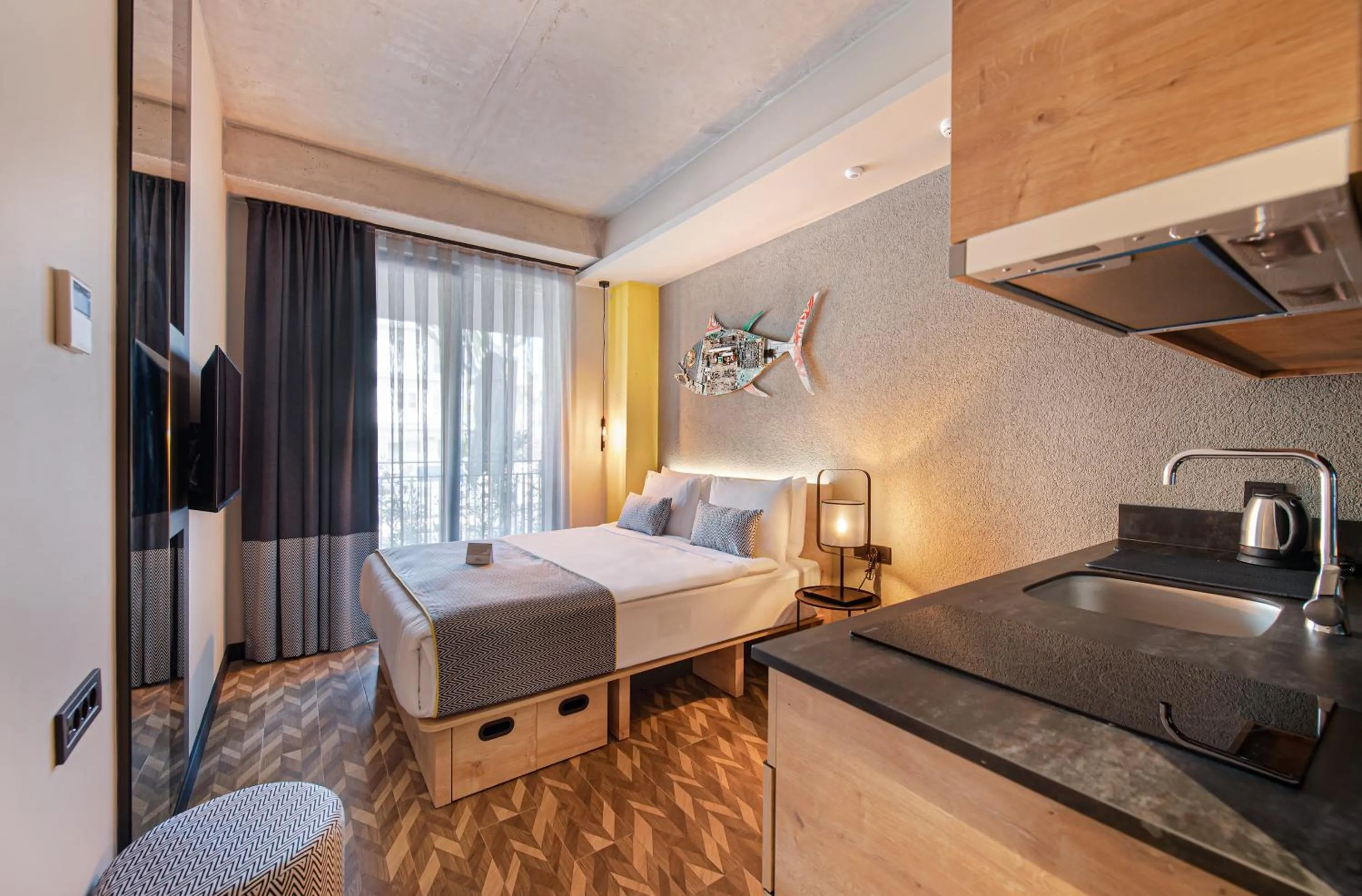 Kitchen or kitchenette, Bed in Trend Suites CYCLE