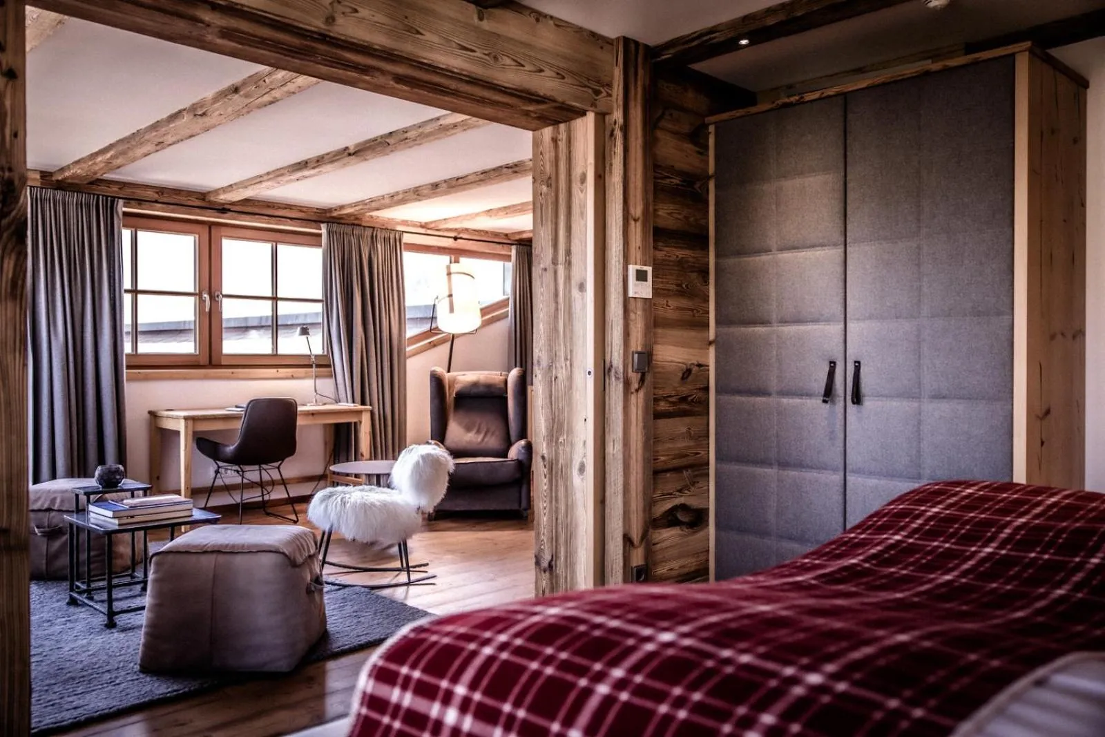 Living room, Bed in Kitzhof Mountain Design Resort, 4 Sterne Superior