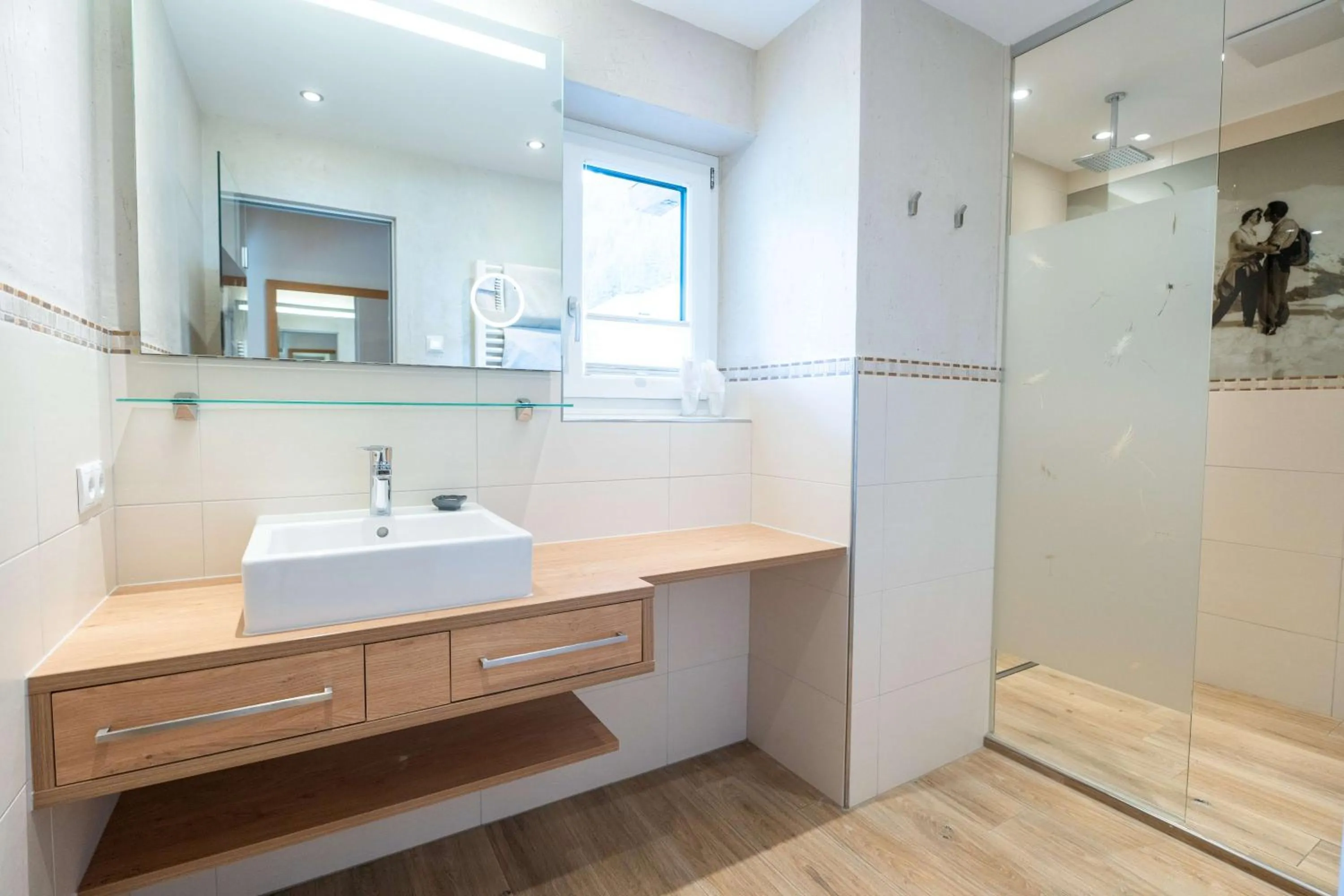 Bathroom in das Alois 4 Sterne Superior