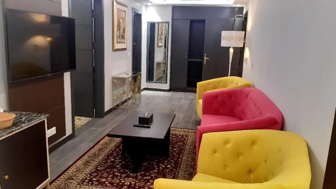 Communal lounge/ TV room in Faletti's Grand Hotel Multan