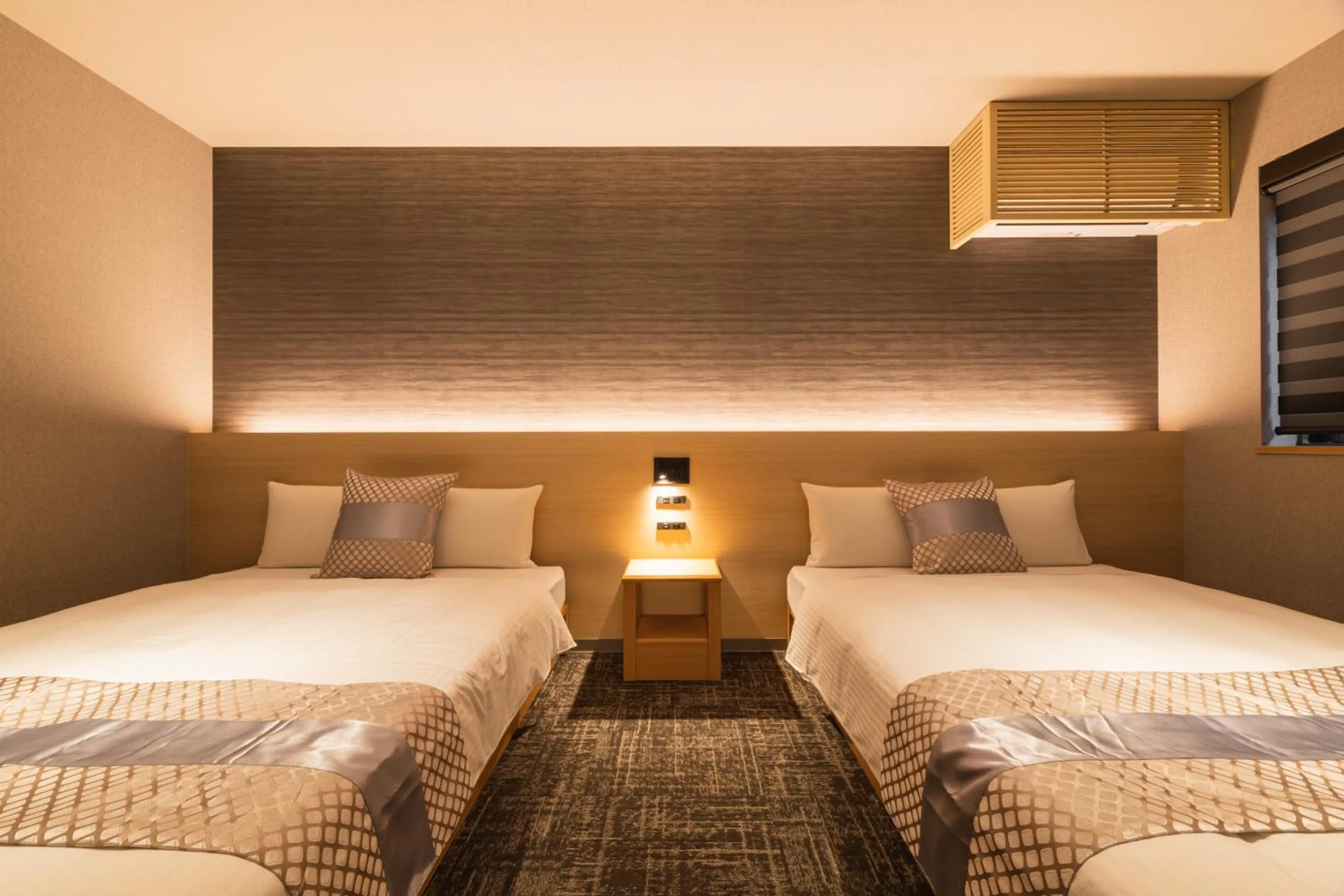 Bed in GRAND BASE Kagoshima Chuo