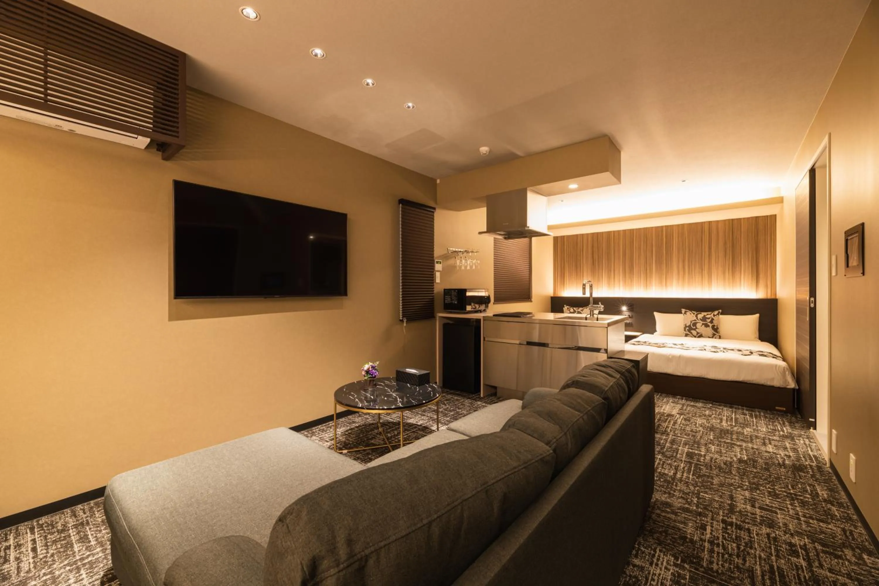 Photo of the whole room, Bed in GRAND BASE Kagoshima Chuo