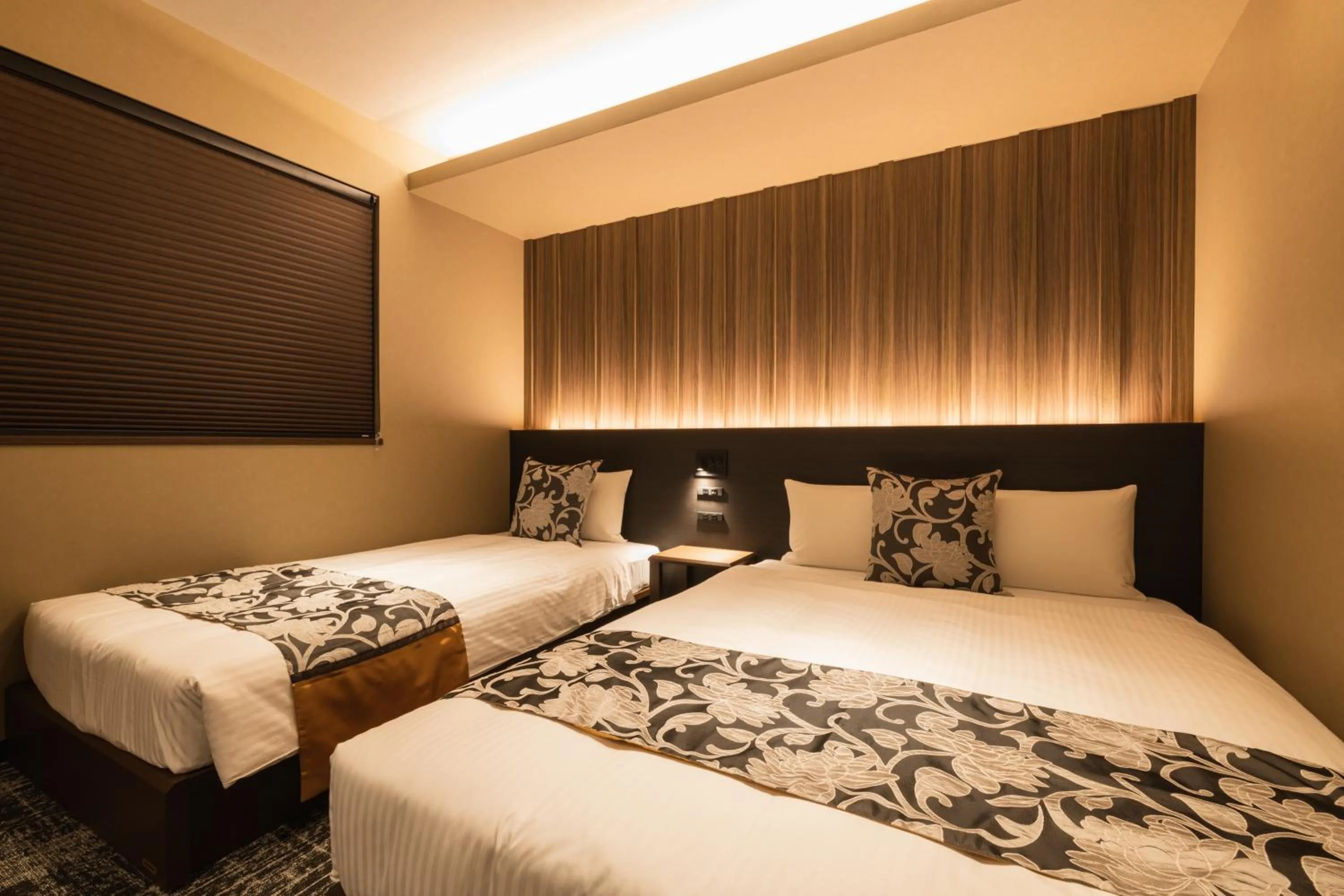 Bed in GRAND BASE Kagoshima Chuo