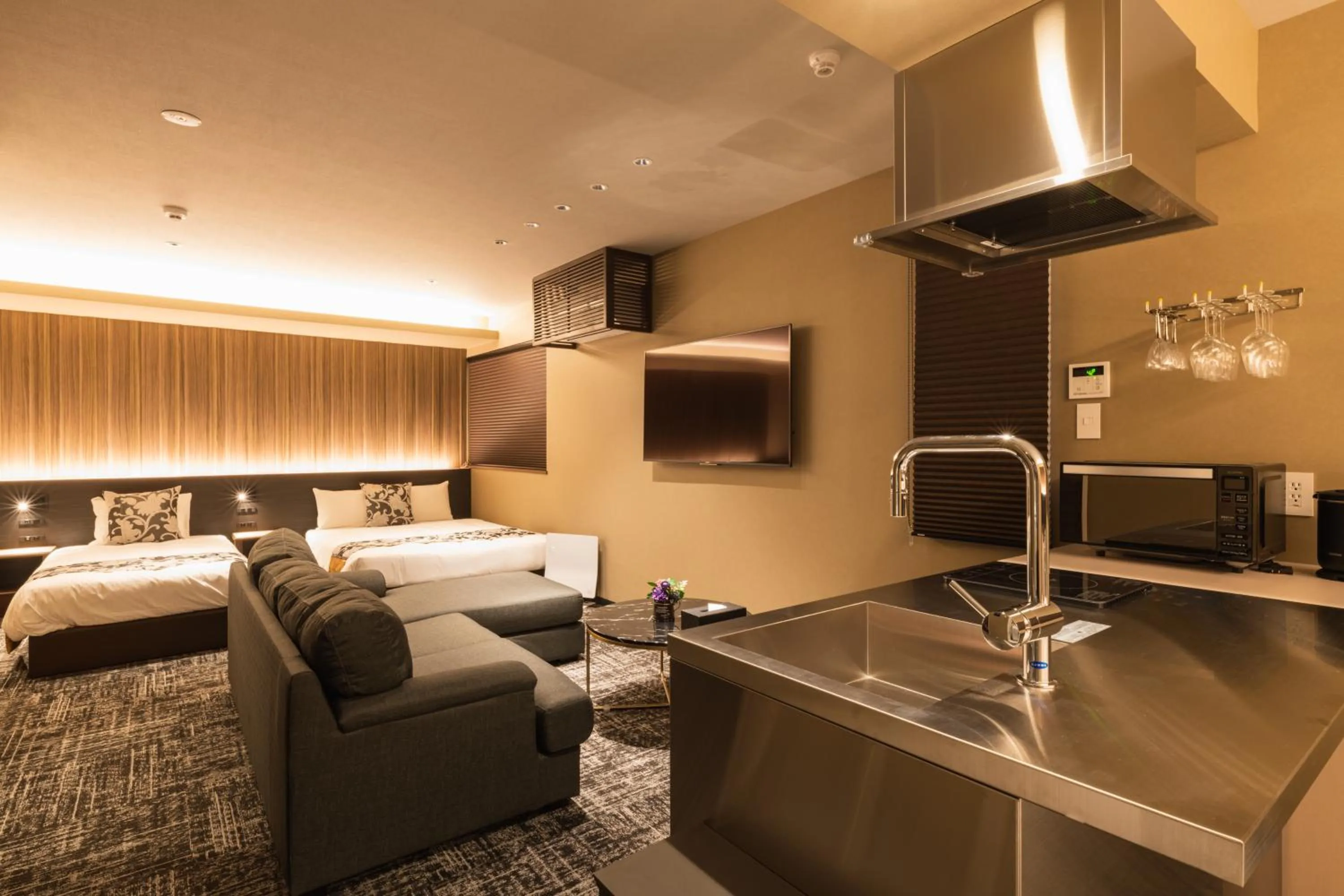 Kitchen or kitchenette, Bed in GRAND BASE Kagoshima Chuo