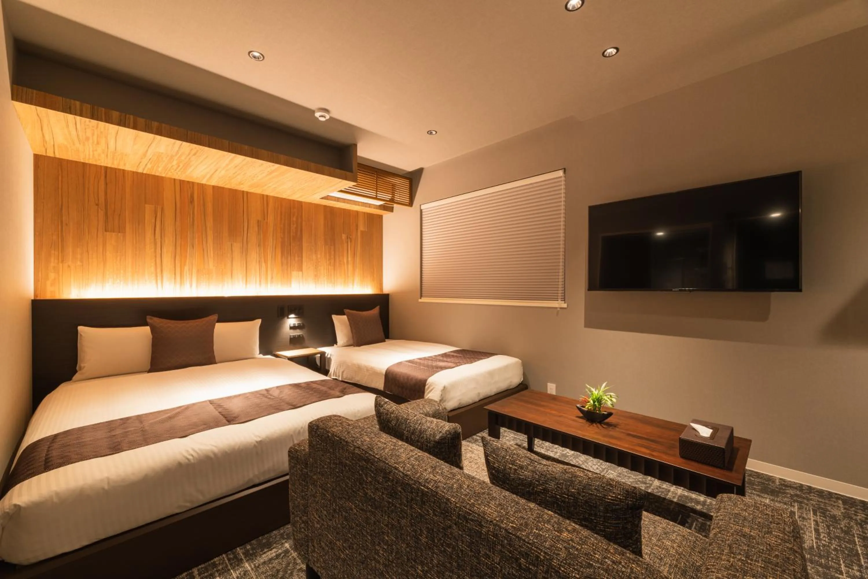 Photo of the whole room, Bed in GRAND BASE Kagoshima Chuo