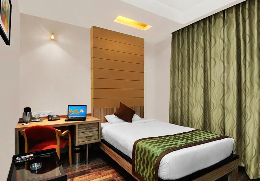 Bed in Hotel City Centre Residency