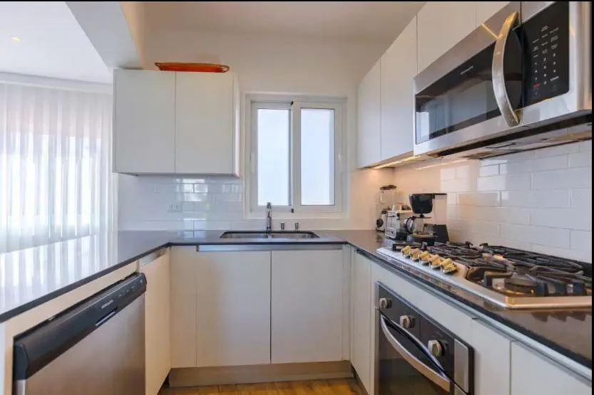 Kitchen or kitchenette in Stanza Mare Beach Front