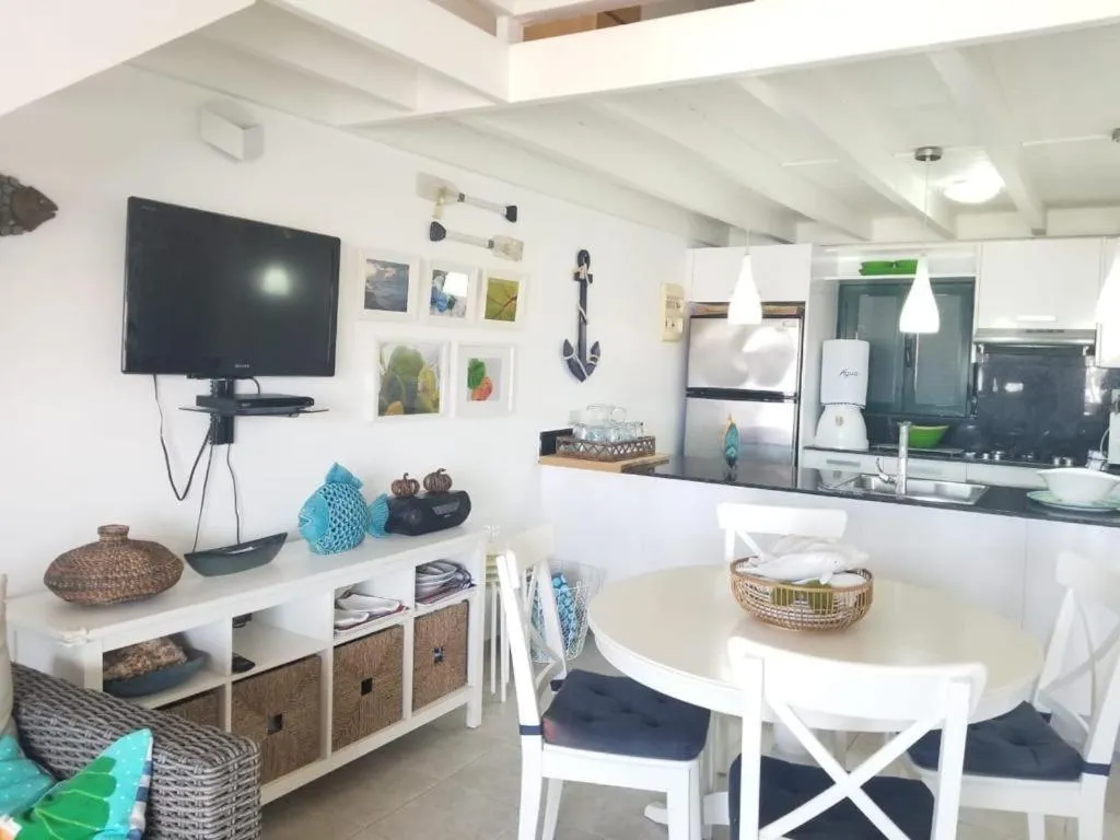 Communal lounge/ TV room in Stanza Mare Beach Front