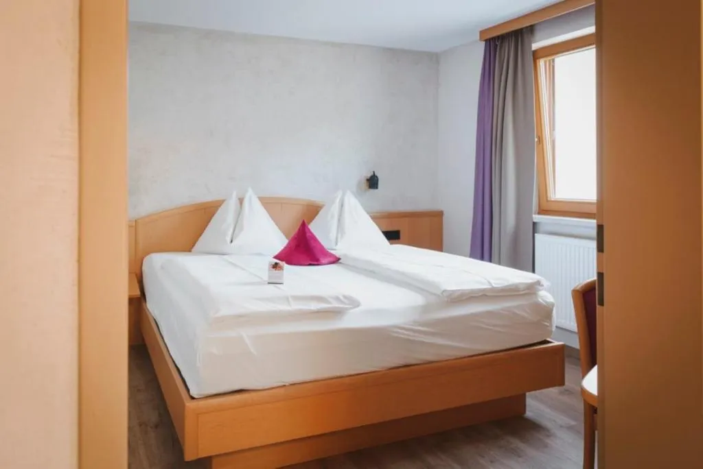 Bed in Boutiquehotel Acherl