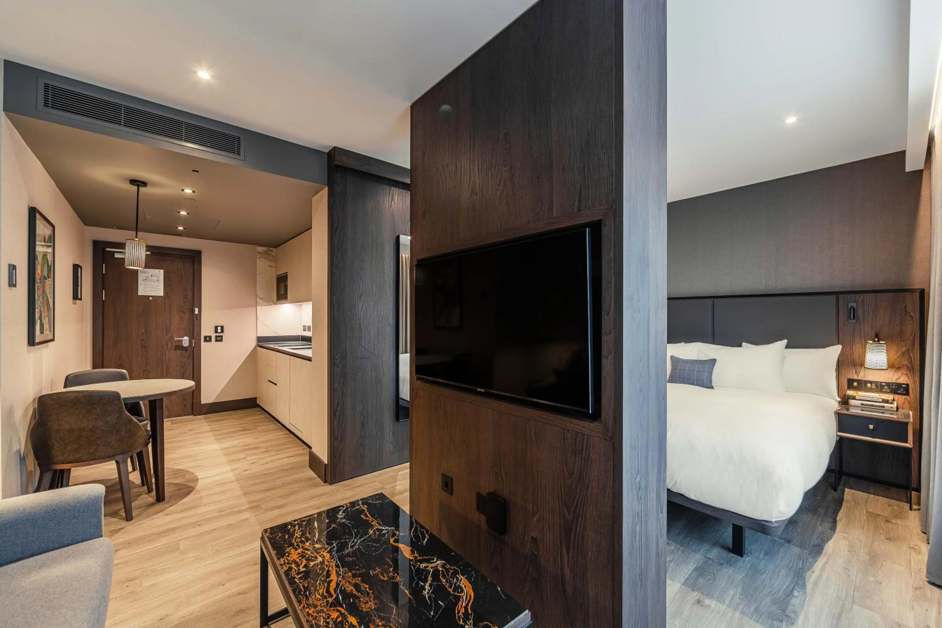 Seating area, Bed in The Fellows House Cambridge, Curio Collection By Hilton