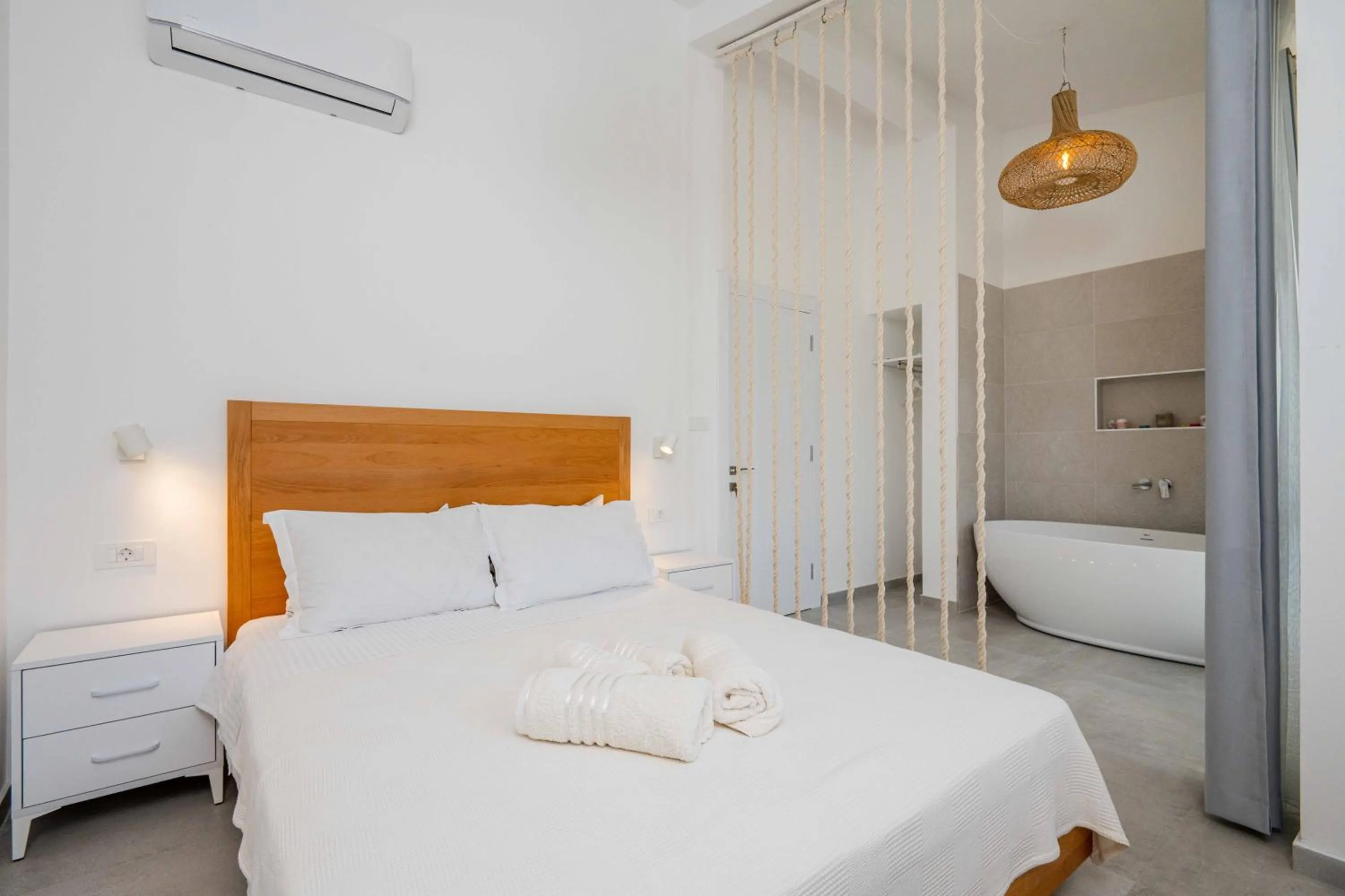 Bed in President Bungalows and Apartments