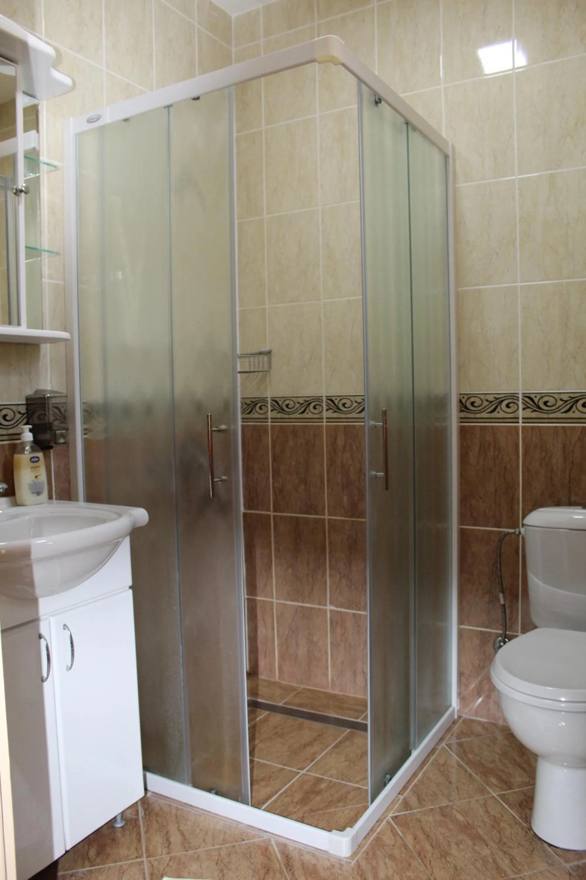 Bathroom in President Bungalows and Apartments