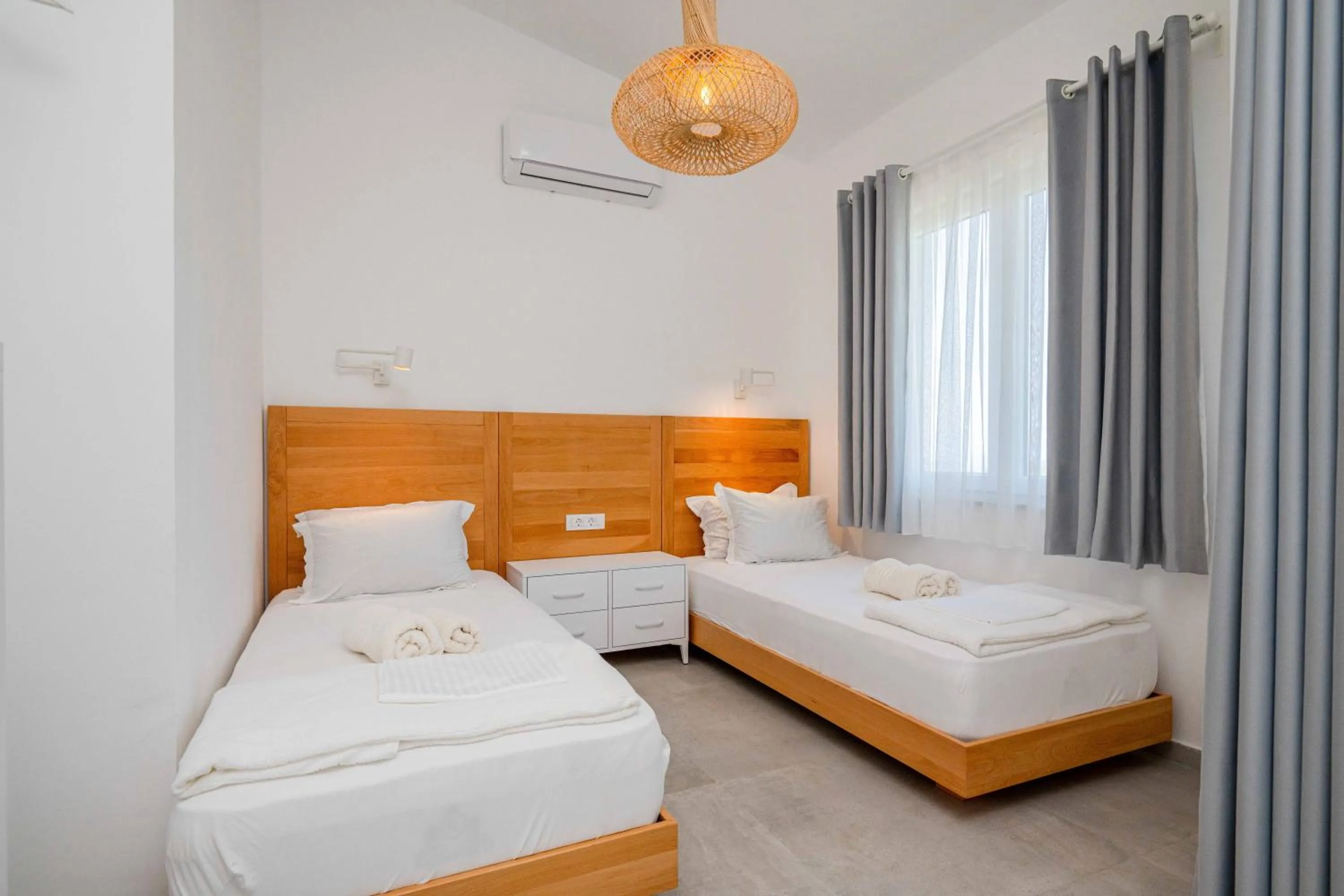 Bed in President Bungalows and Apartments