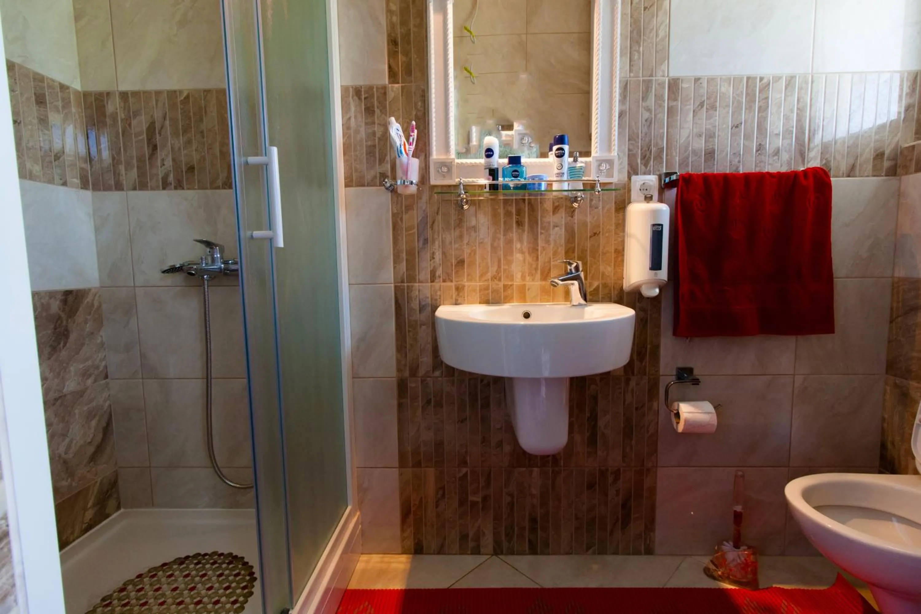 Bathroom in President Bungalows and Apartments