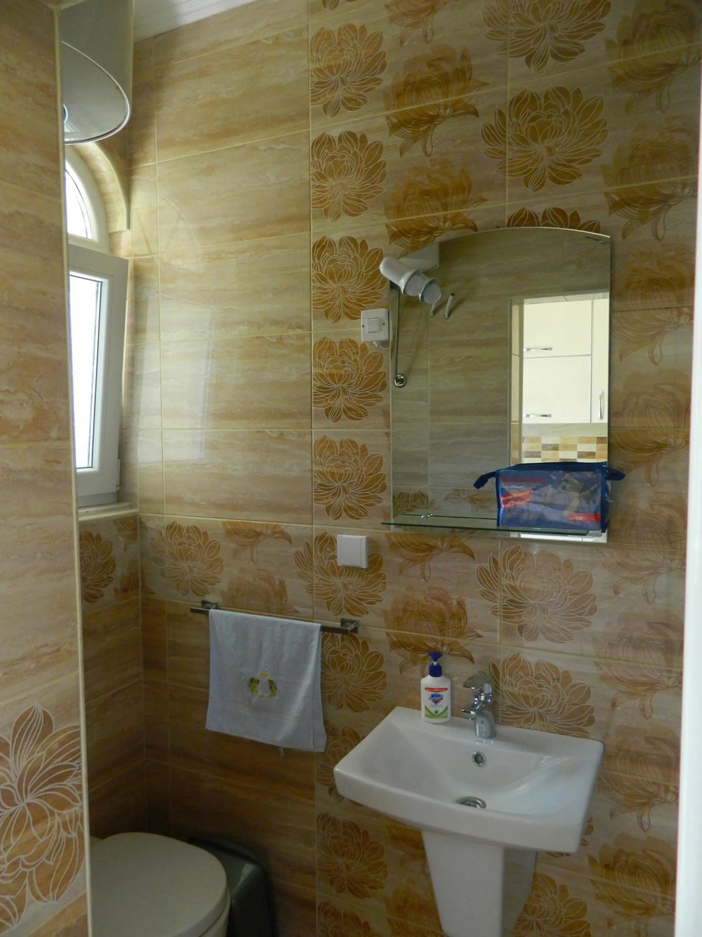 Bathroom in President Bungalows and Apartments