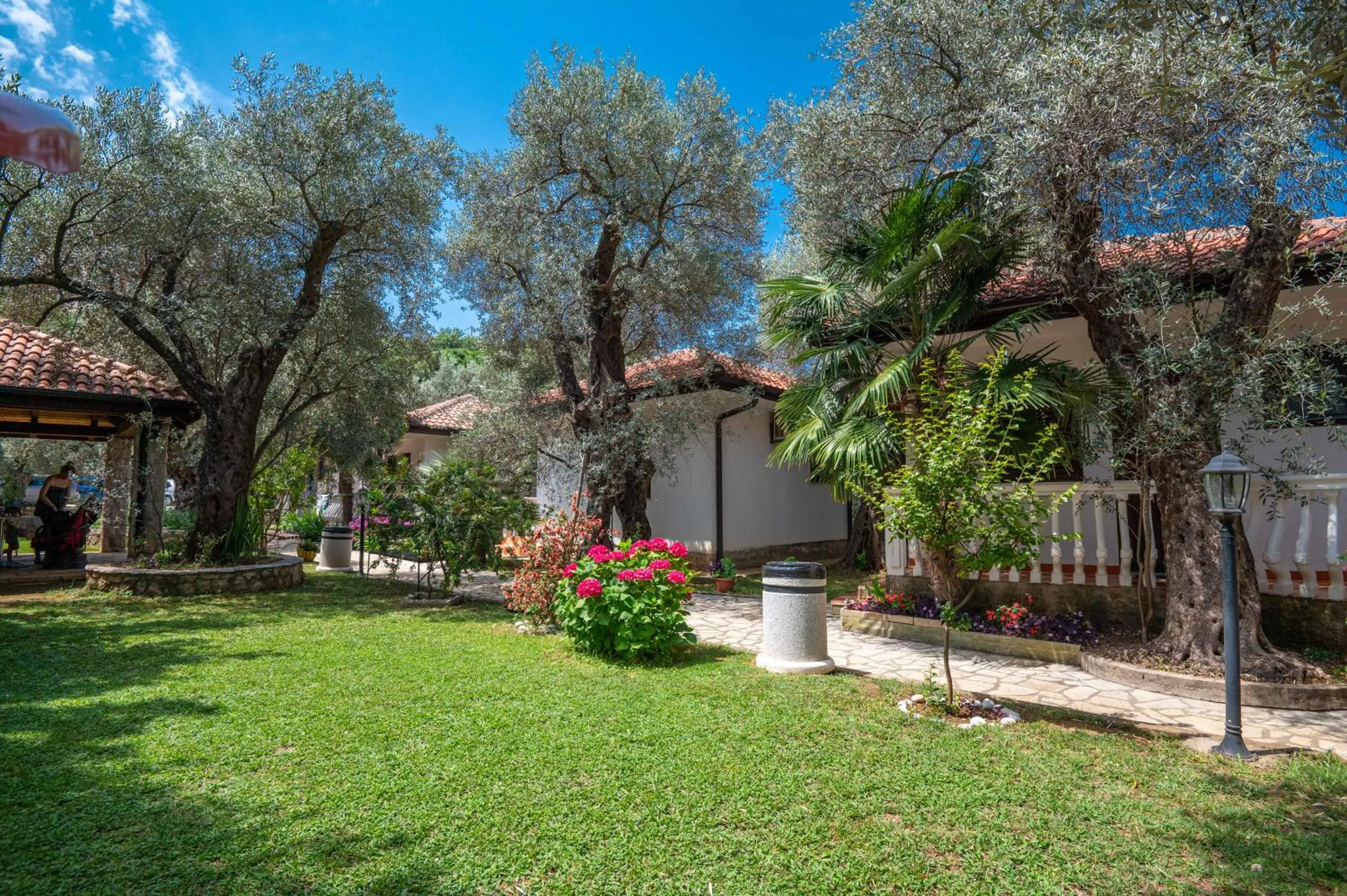 Garden view in President Bungalows and Apartments