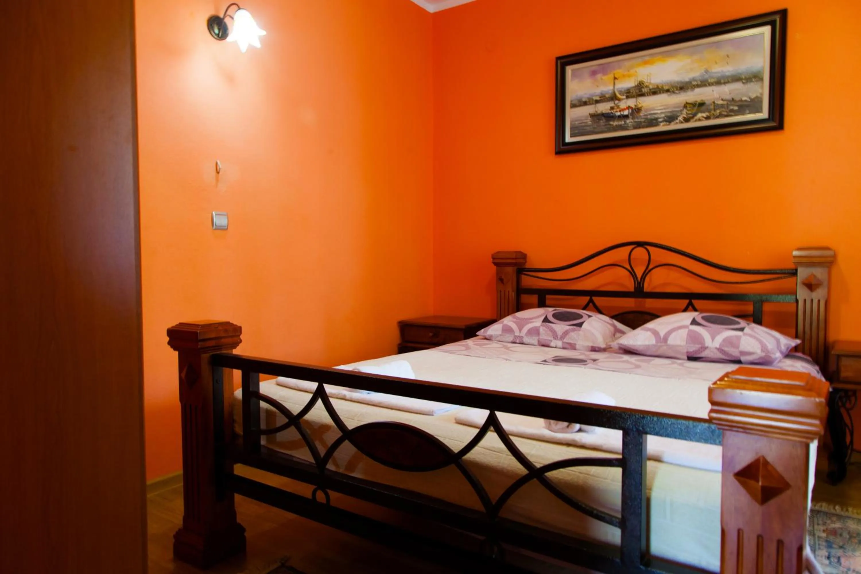Bed in President Bungalows and Apartments