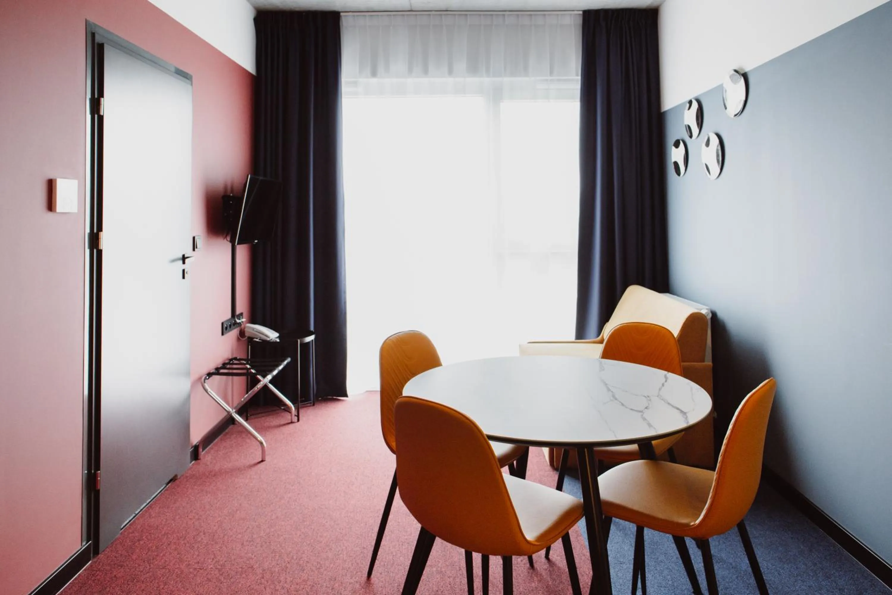 Seating area in Arche Hotel Piła