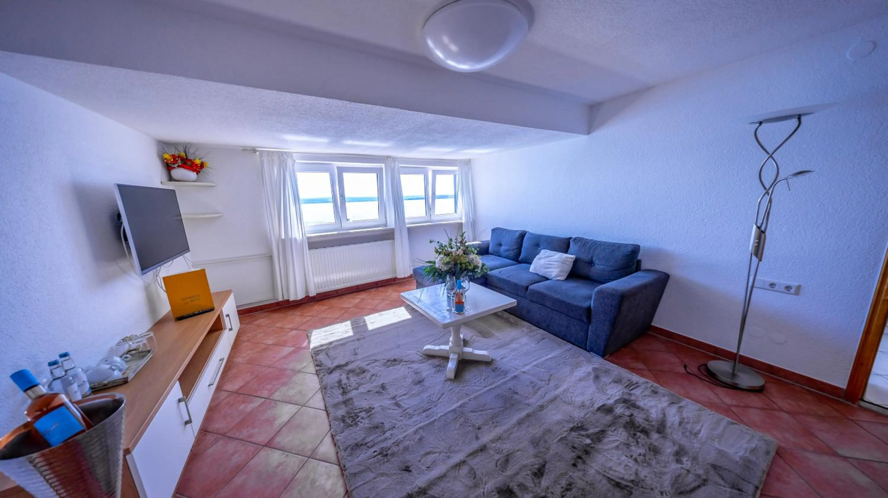 Communal lounge/ TV room in Seehotel ZUR MÜNZ