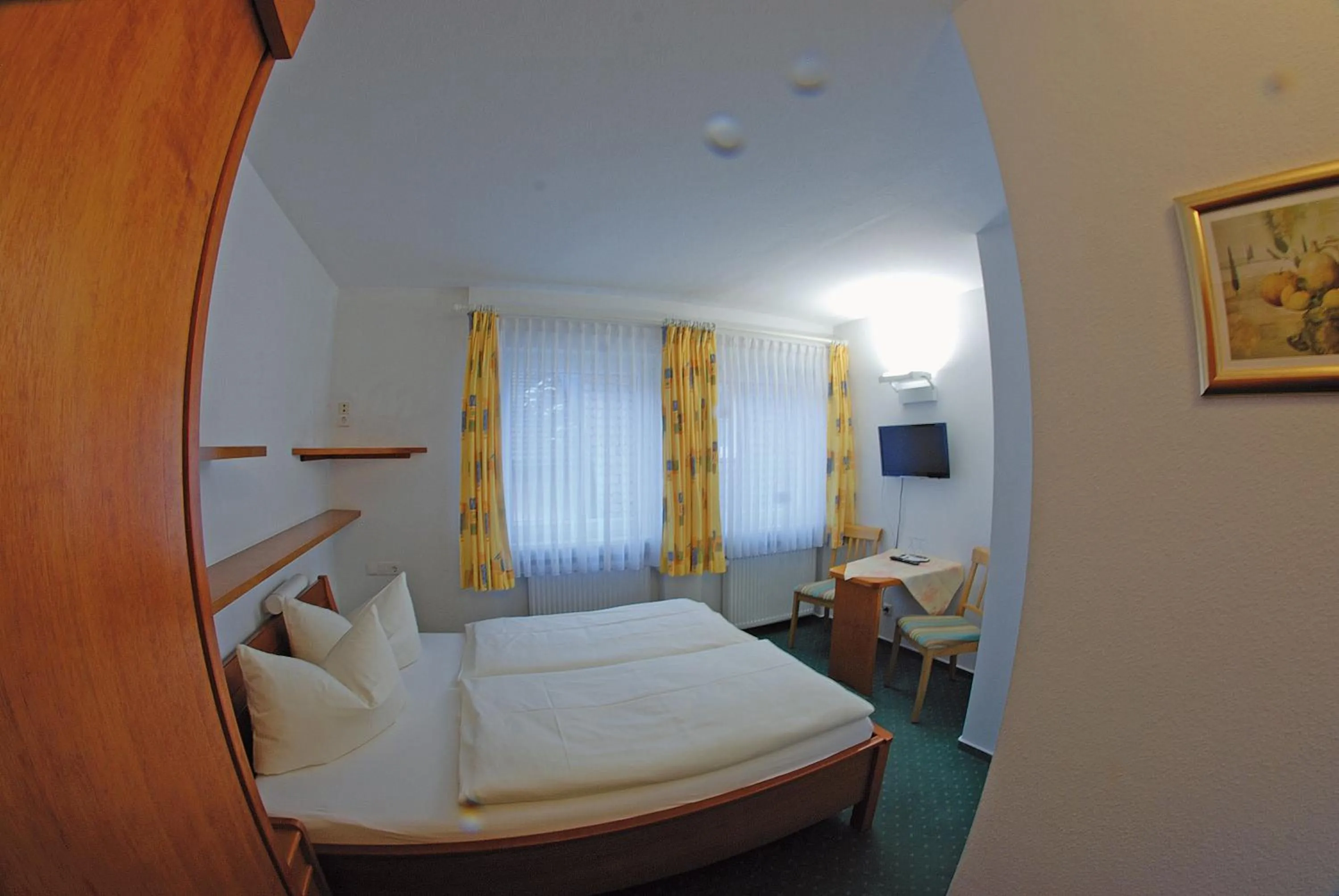Photo of the whole room, Bed in Seehotel ZUR MÜNZ