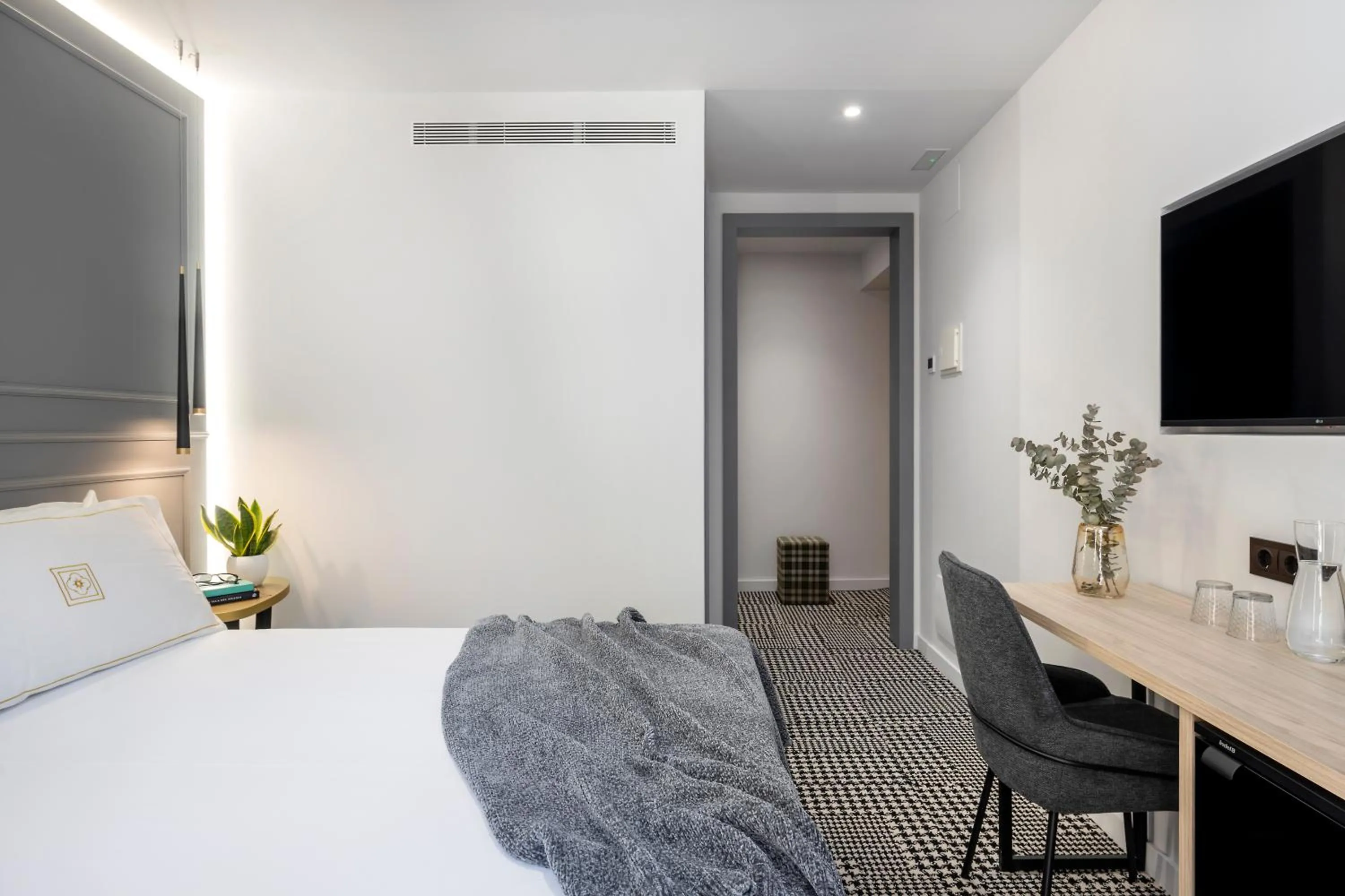 Bed in Cal Roure Boutique Hotel