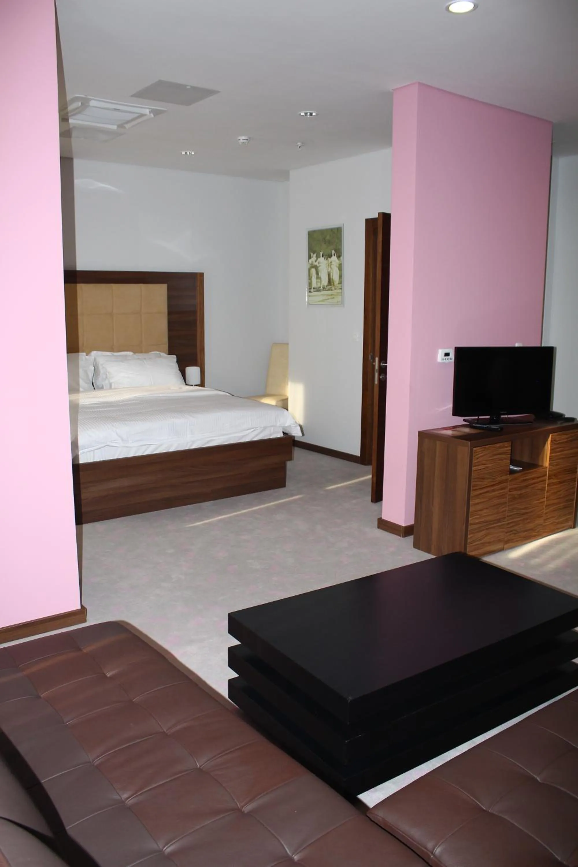 Living room, Bed in Hotel Franca