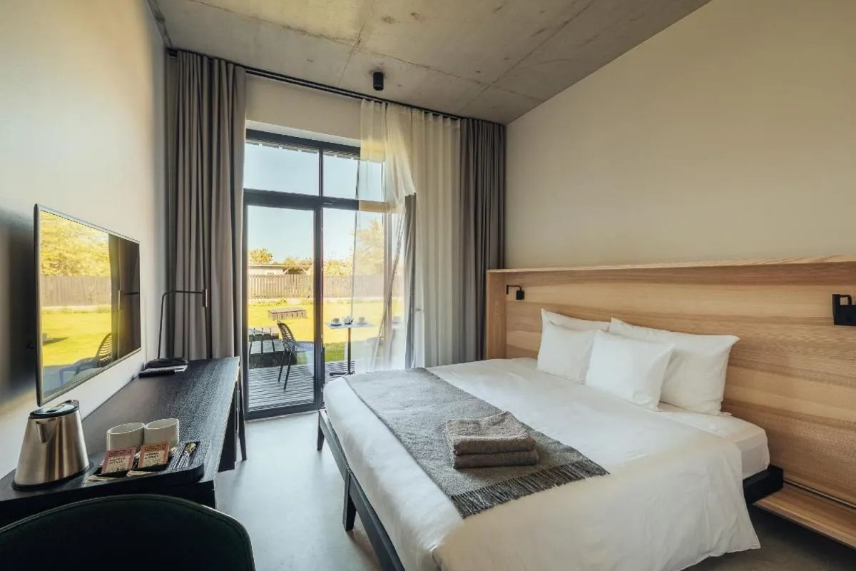 Bed in OTTO Hotel & Sun