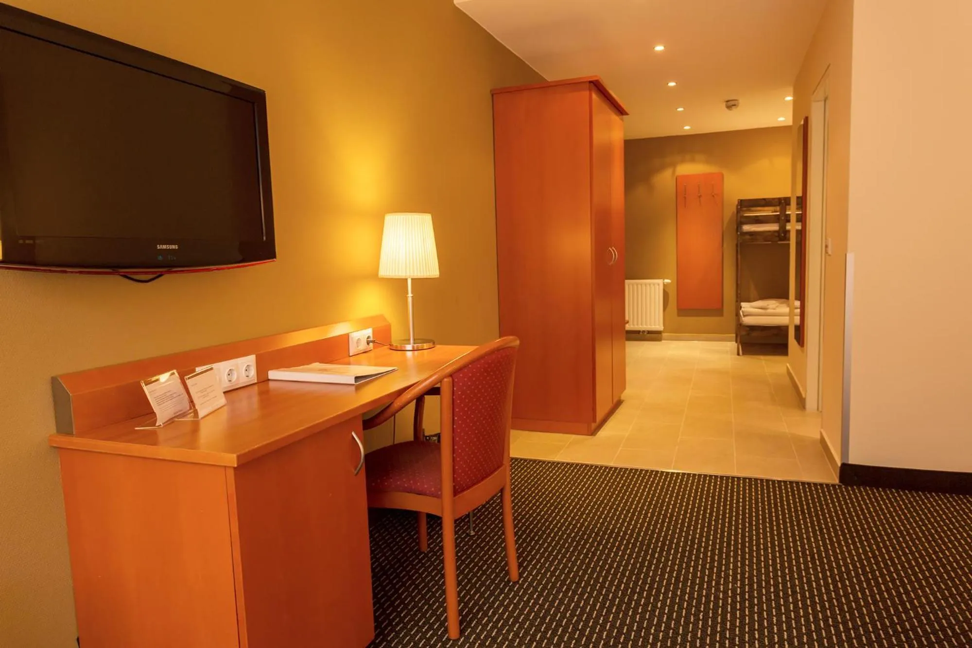 Seating area, Bed in Central Hotel Löwen