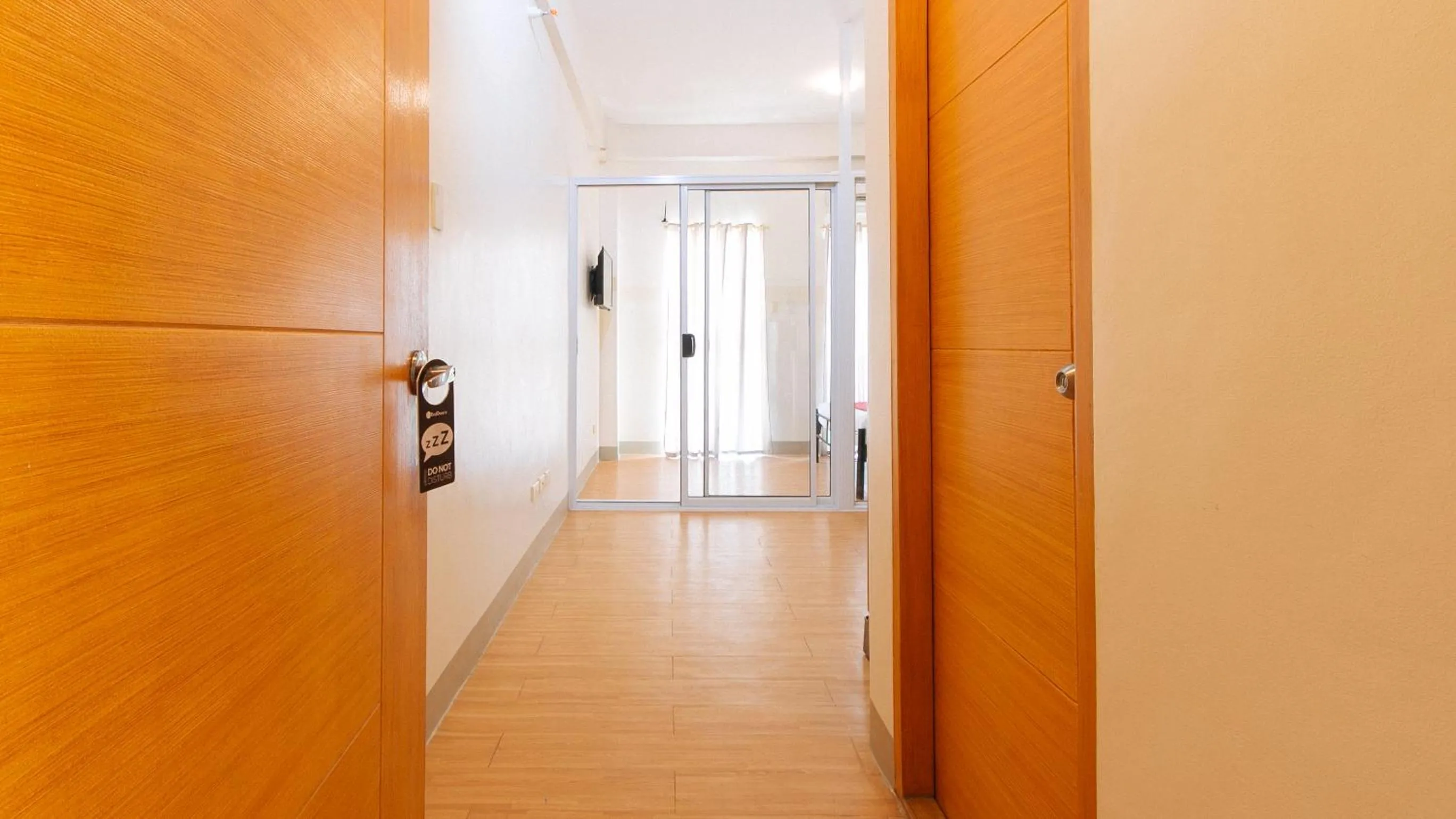 wardrobe in RedDoorz Plus at Alpina Heights Paranaque