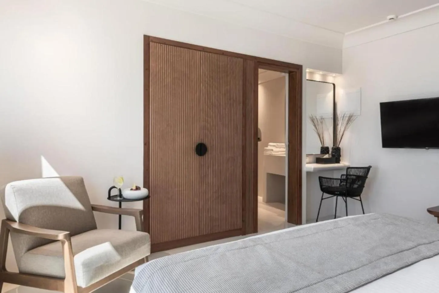 Bed in Akra Suites & Spa