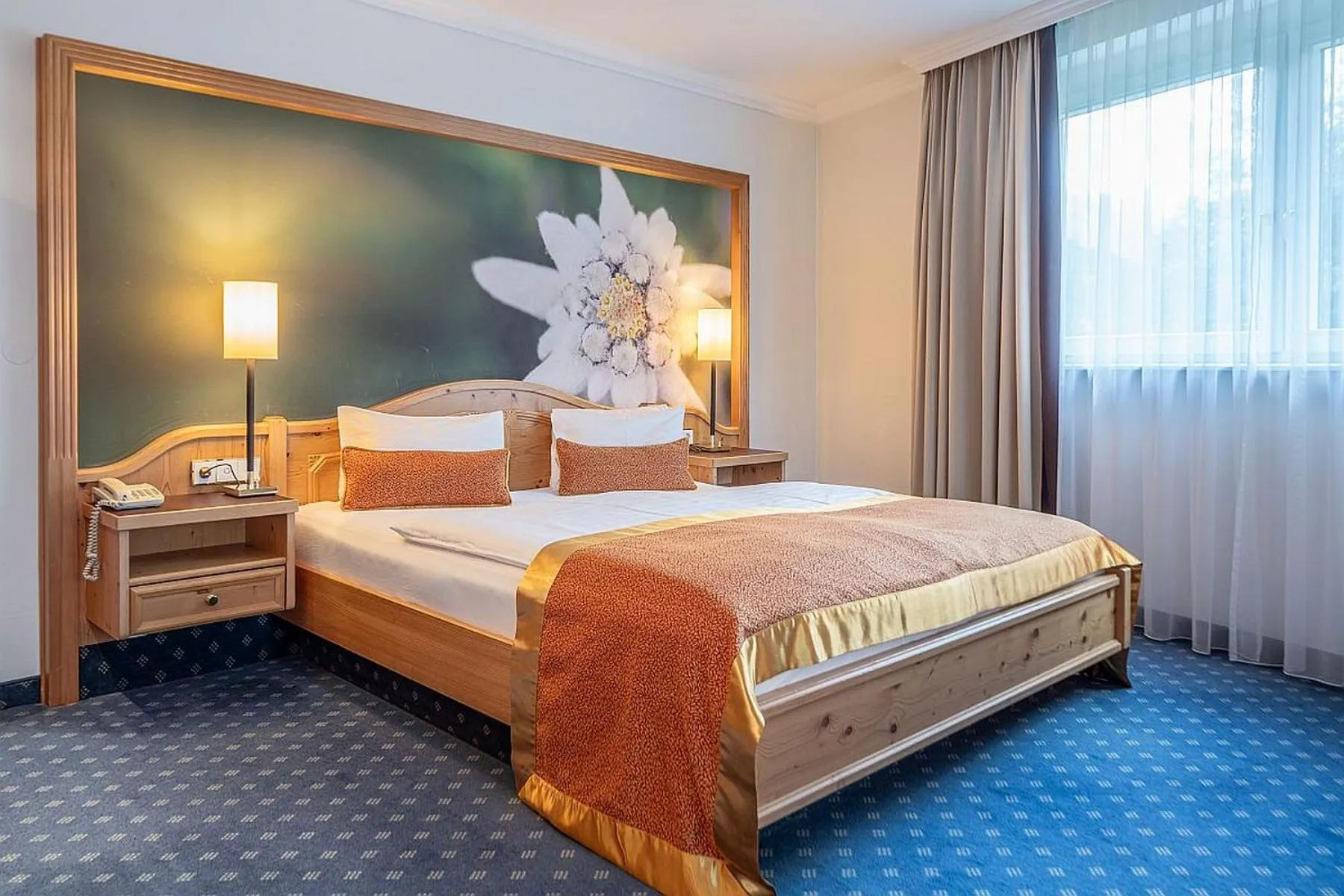 Bed in EUROPÄISCHER HOF Bad Gastein