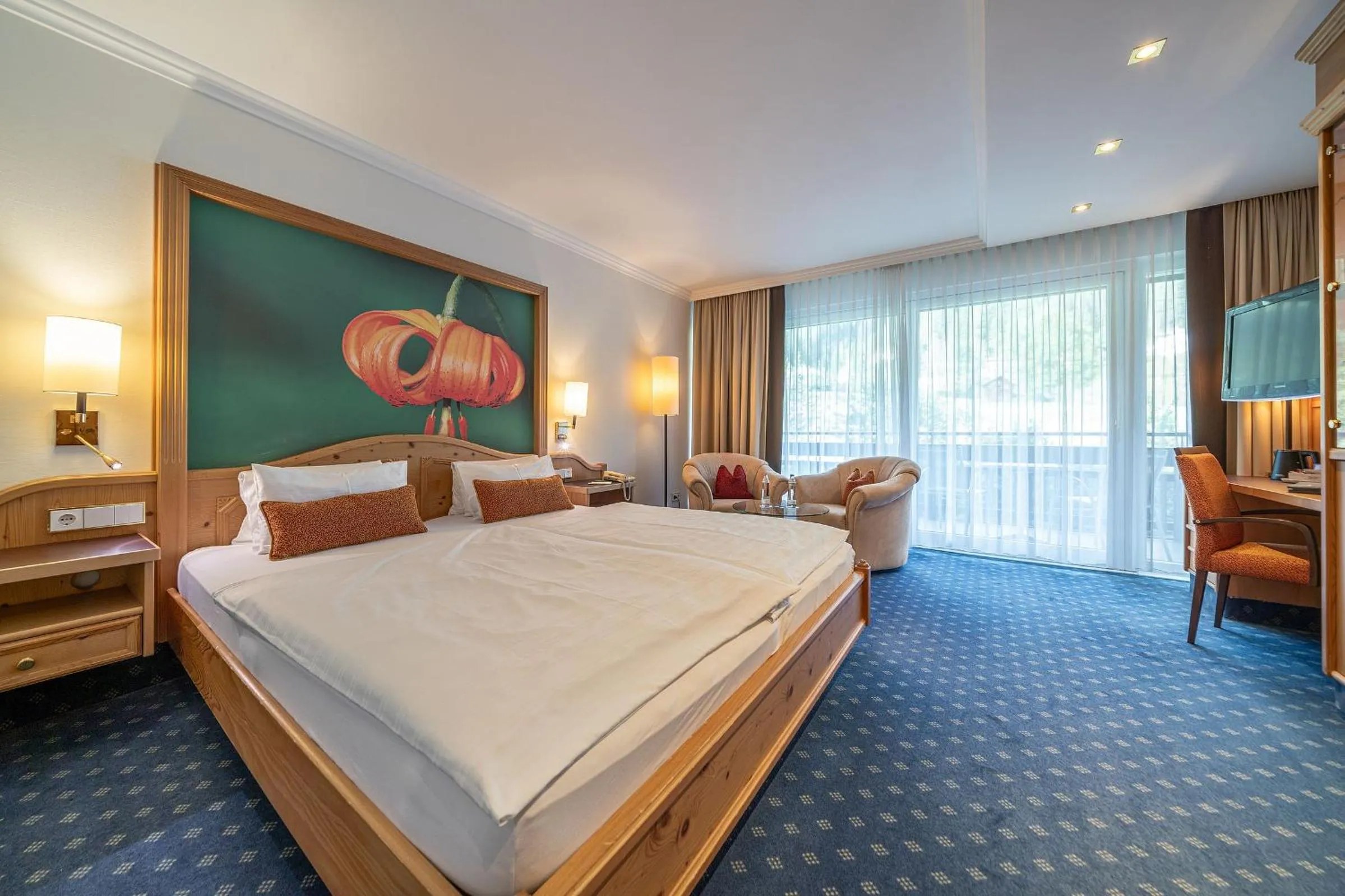 Bed in EUROPÄISCHER HOF Bad Gastein