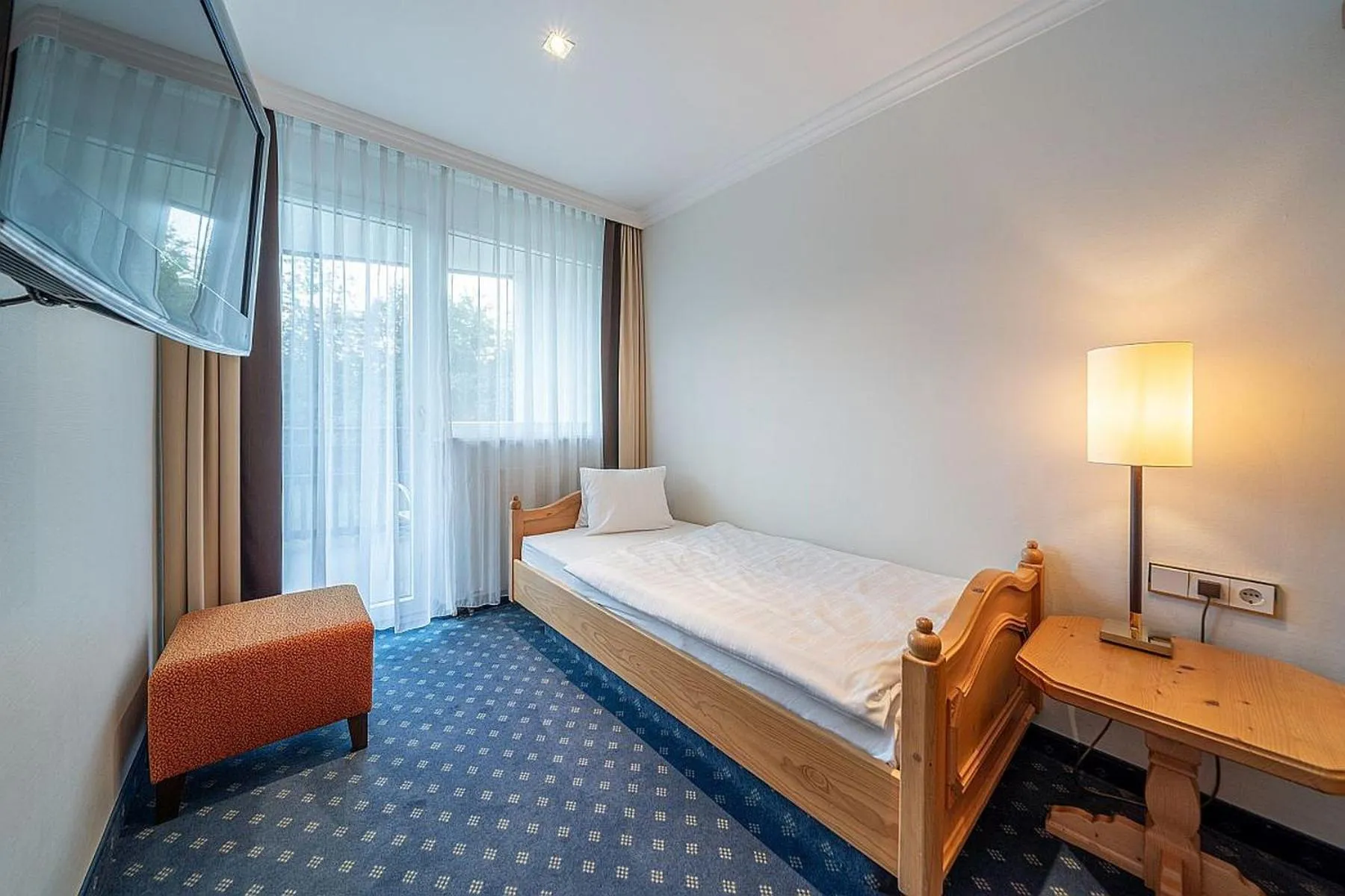 Bed in EUROPÄISCHER HOF Bad Gastein