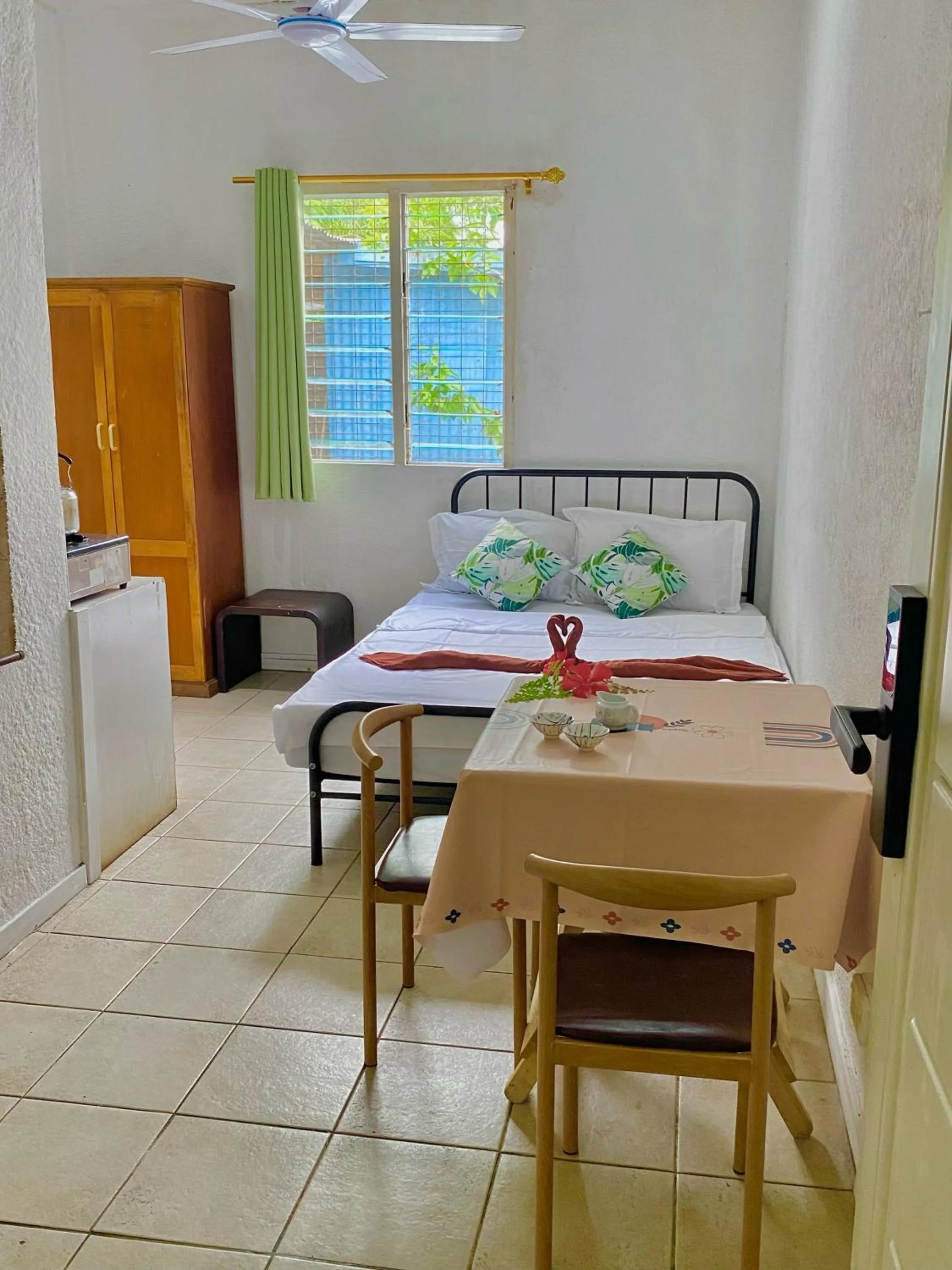 Bed in Room With A View & Apartment Style