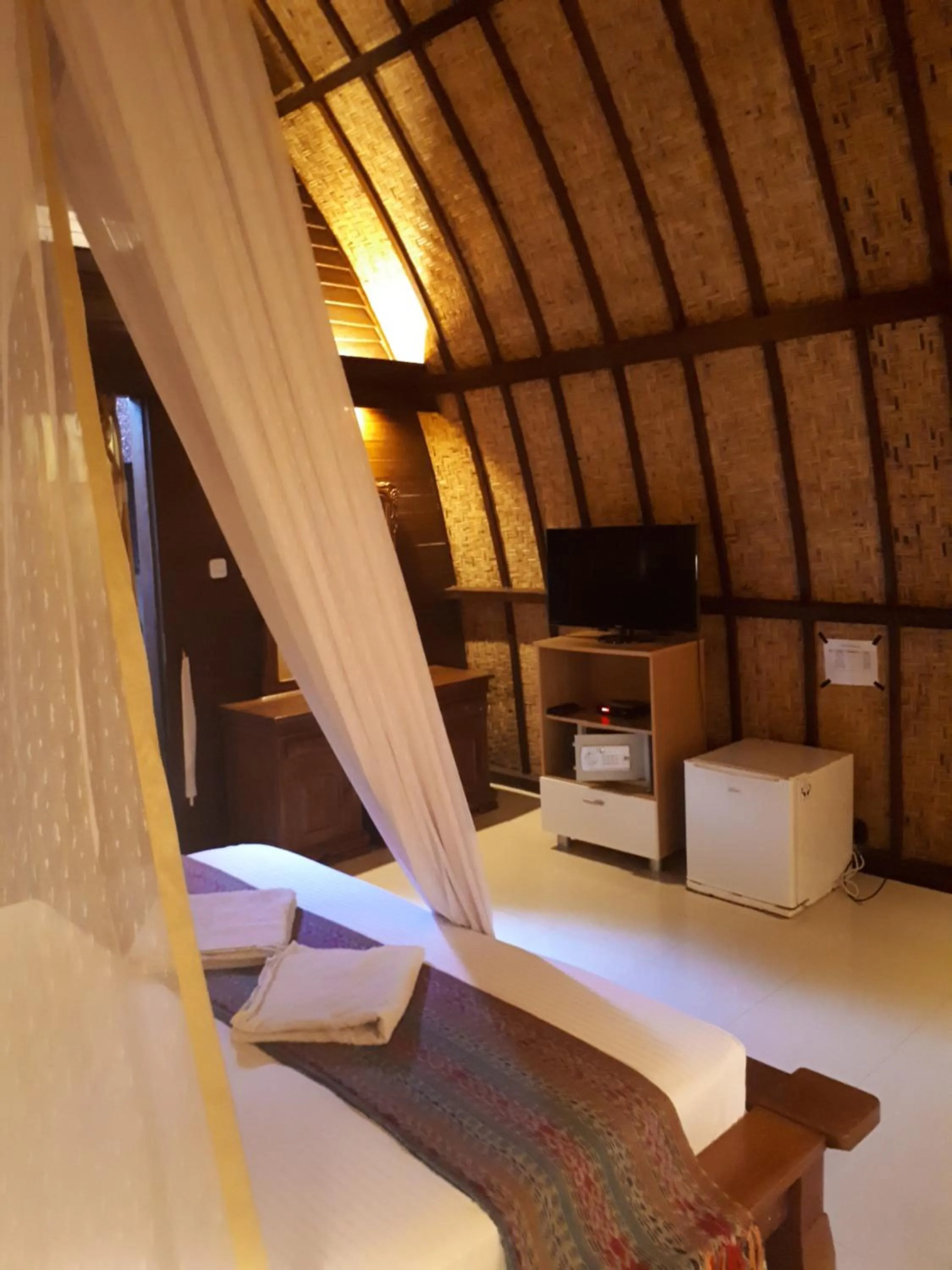 Bed in Sandy Beach Bungalows