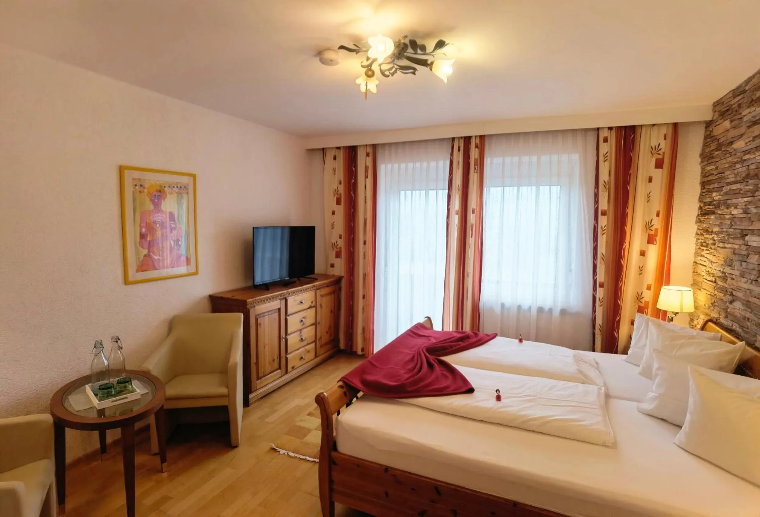 Living room, Bed in Hotel Kärntnerhof & Suiten 3-Stern Superior