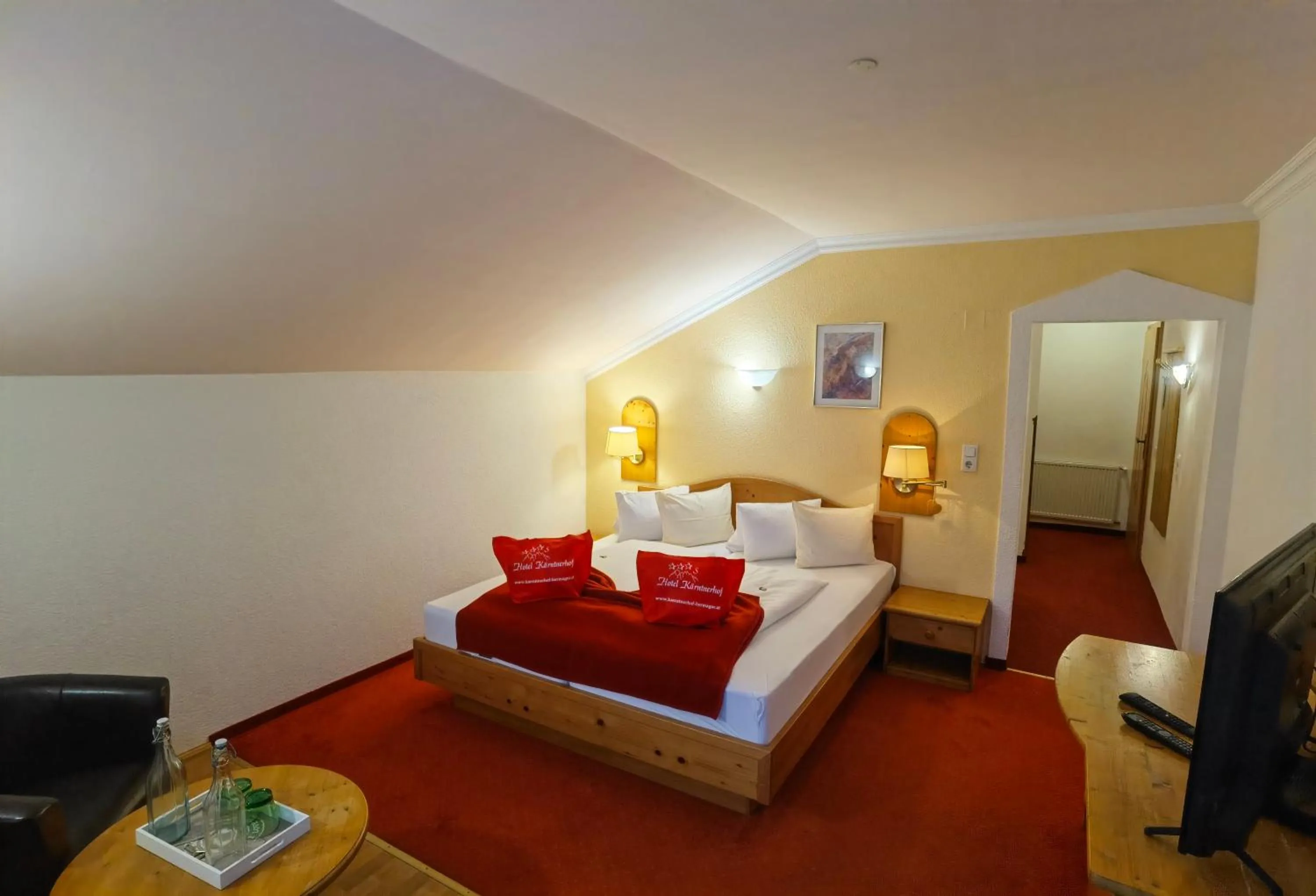 Bed in Hotel Kärntnerhof & Suiten 3-Stern Superior