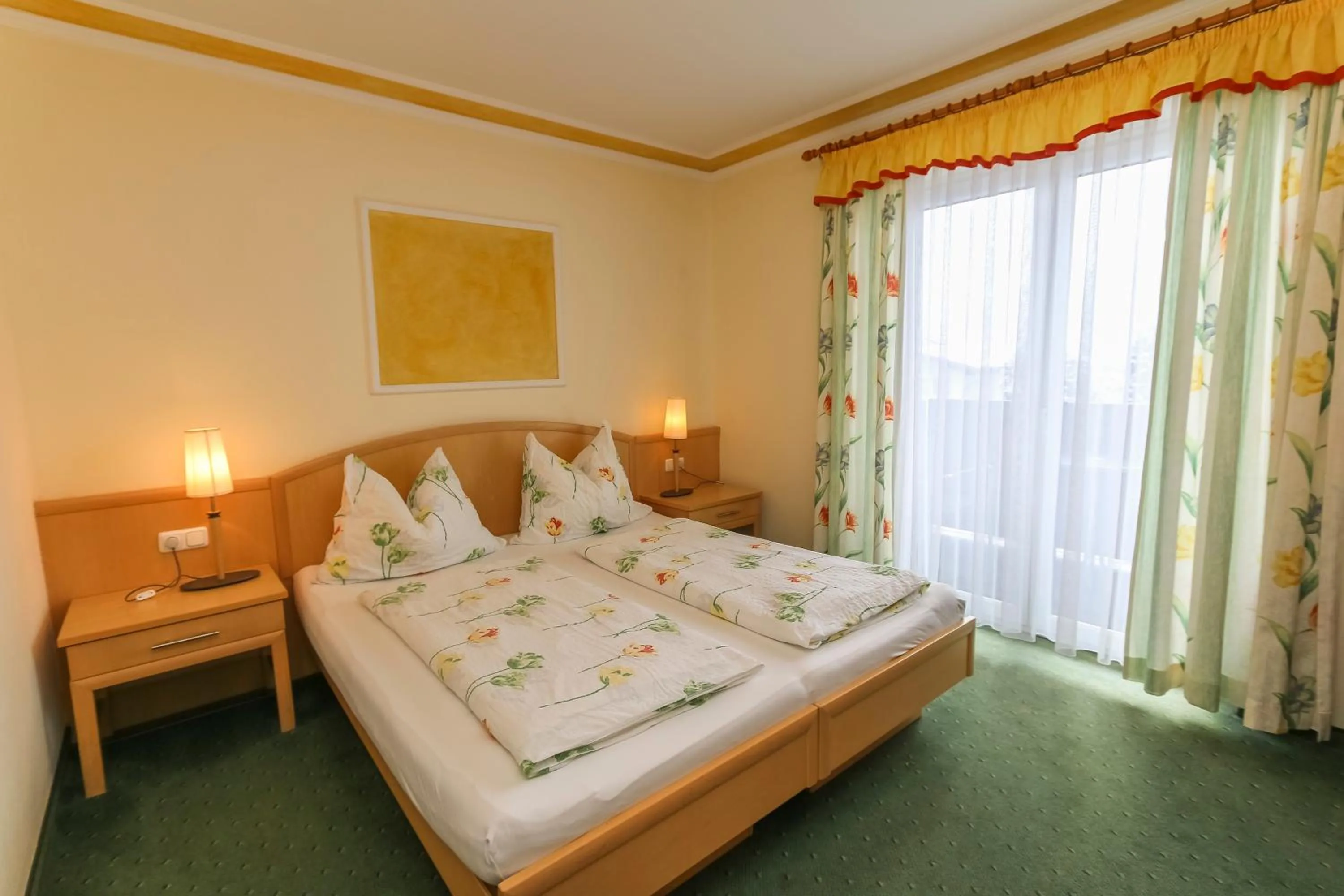 Photo of the whole room, Bed in Alpenhotel Tauernstüberl