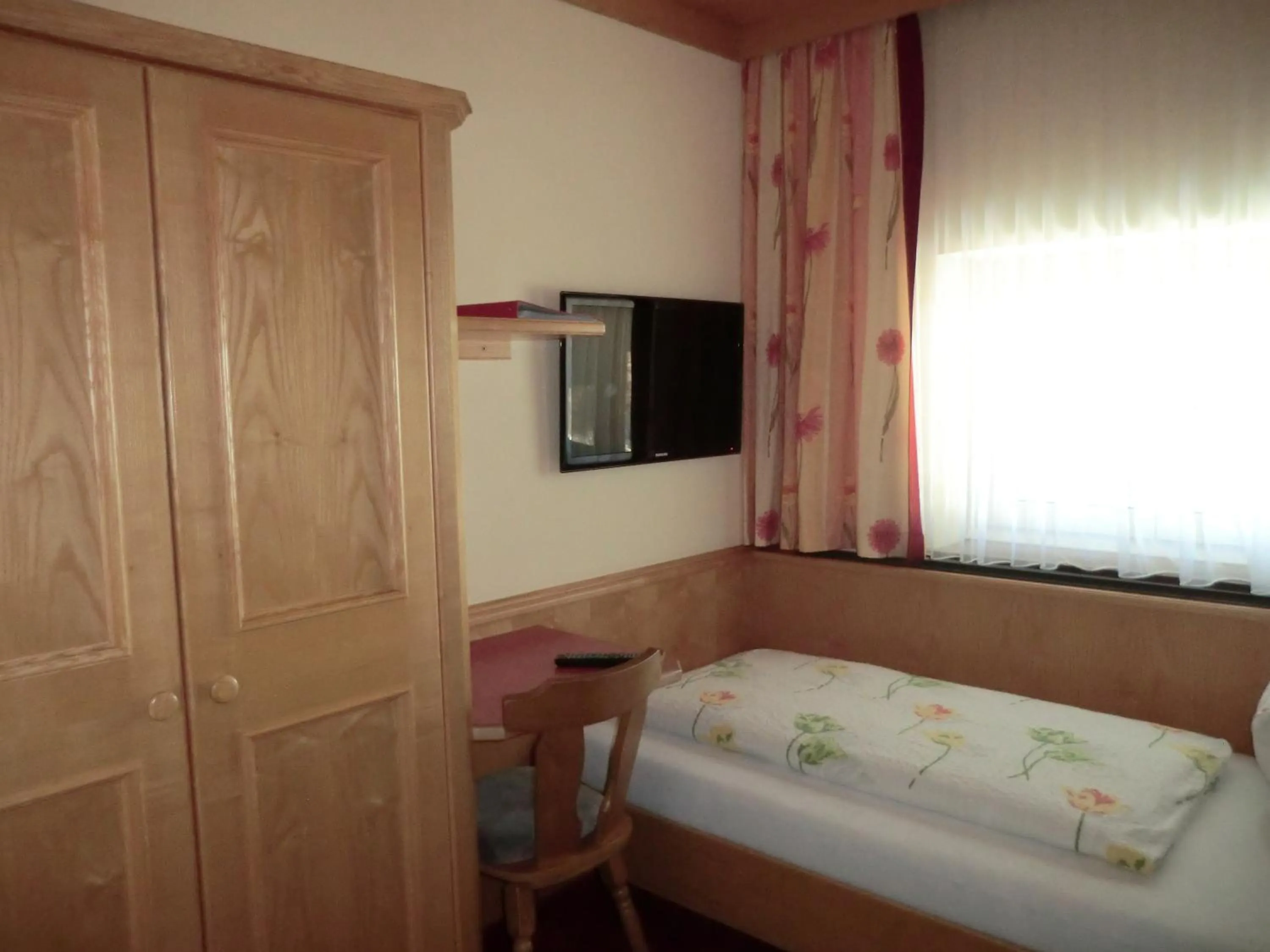 Bed in Alpenhotel Tauernstüberl