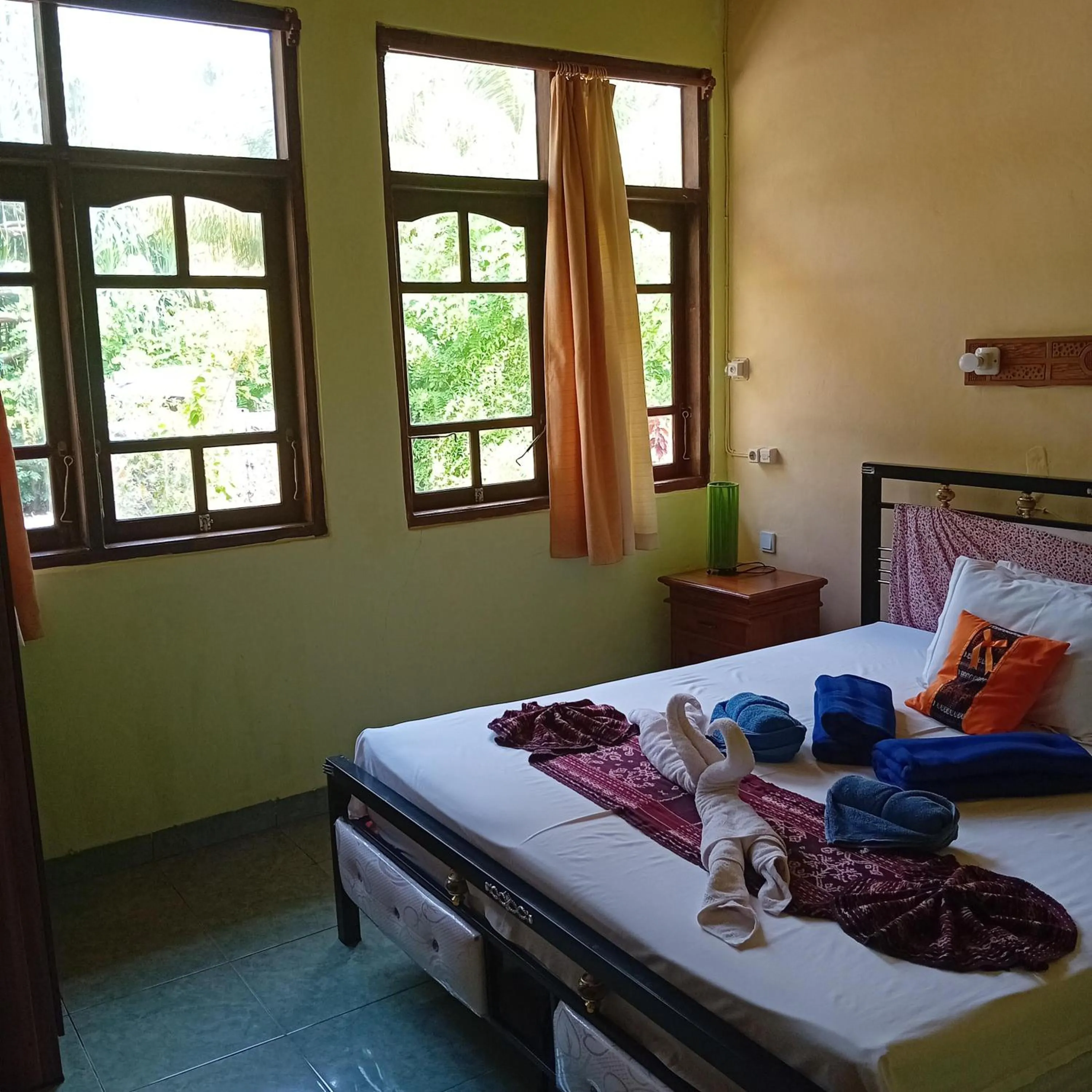 Bed in Budi Sun Resort