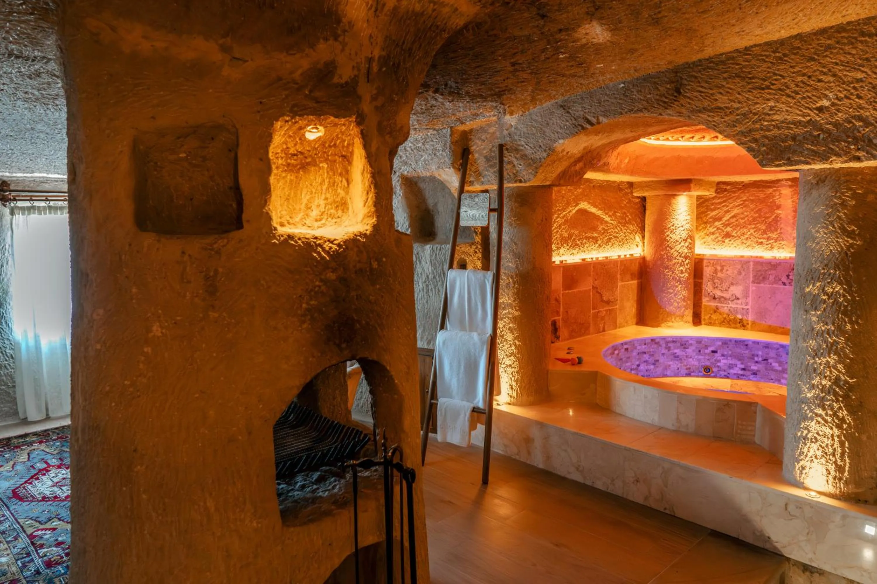 fireplace, Bed in Utopia Cave Cappadocia