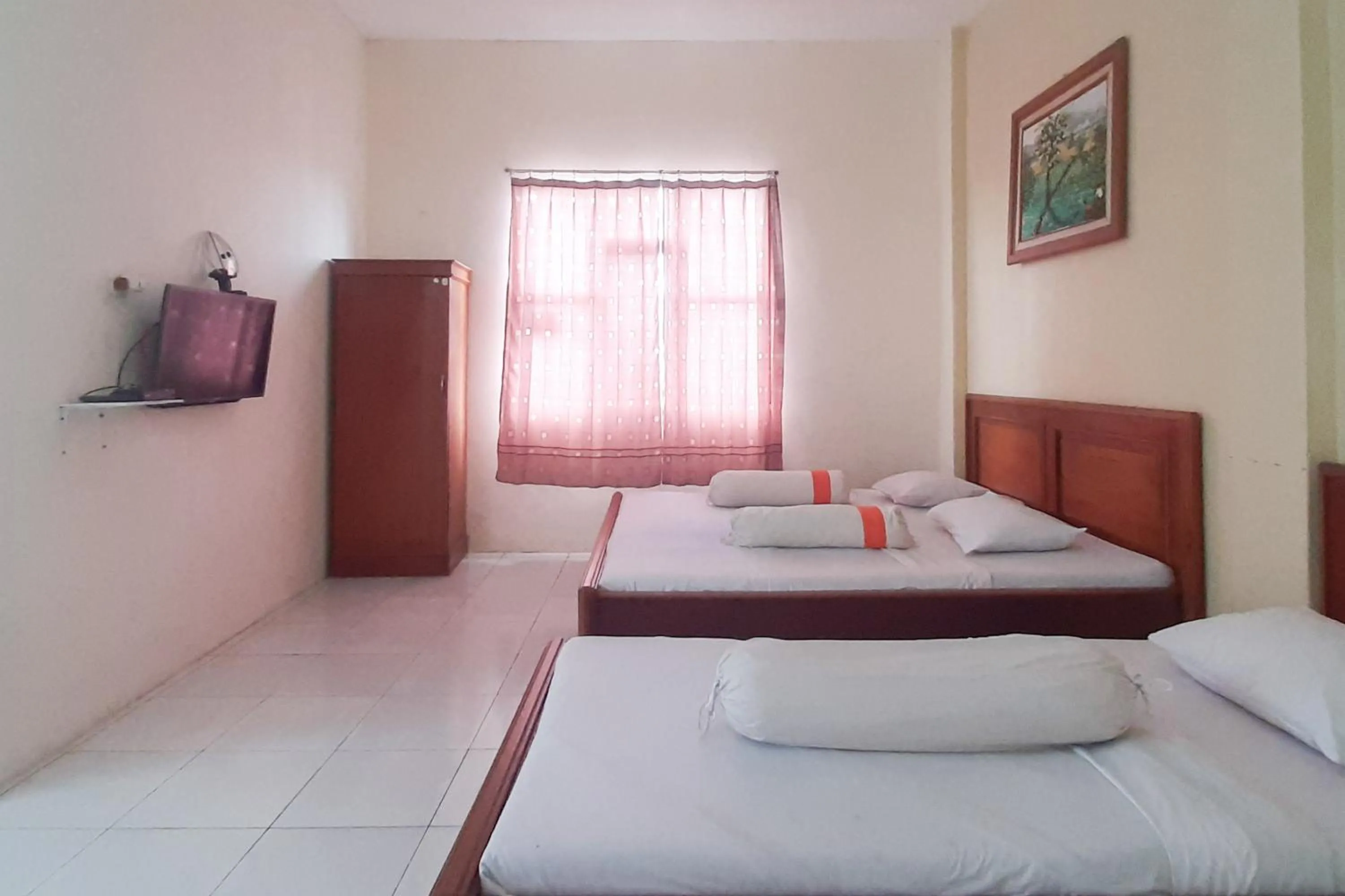 Bed in RedDoorz Syariah At Penginapan Sederhana Palembang